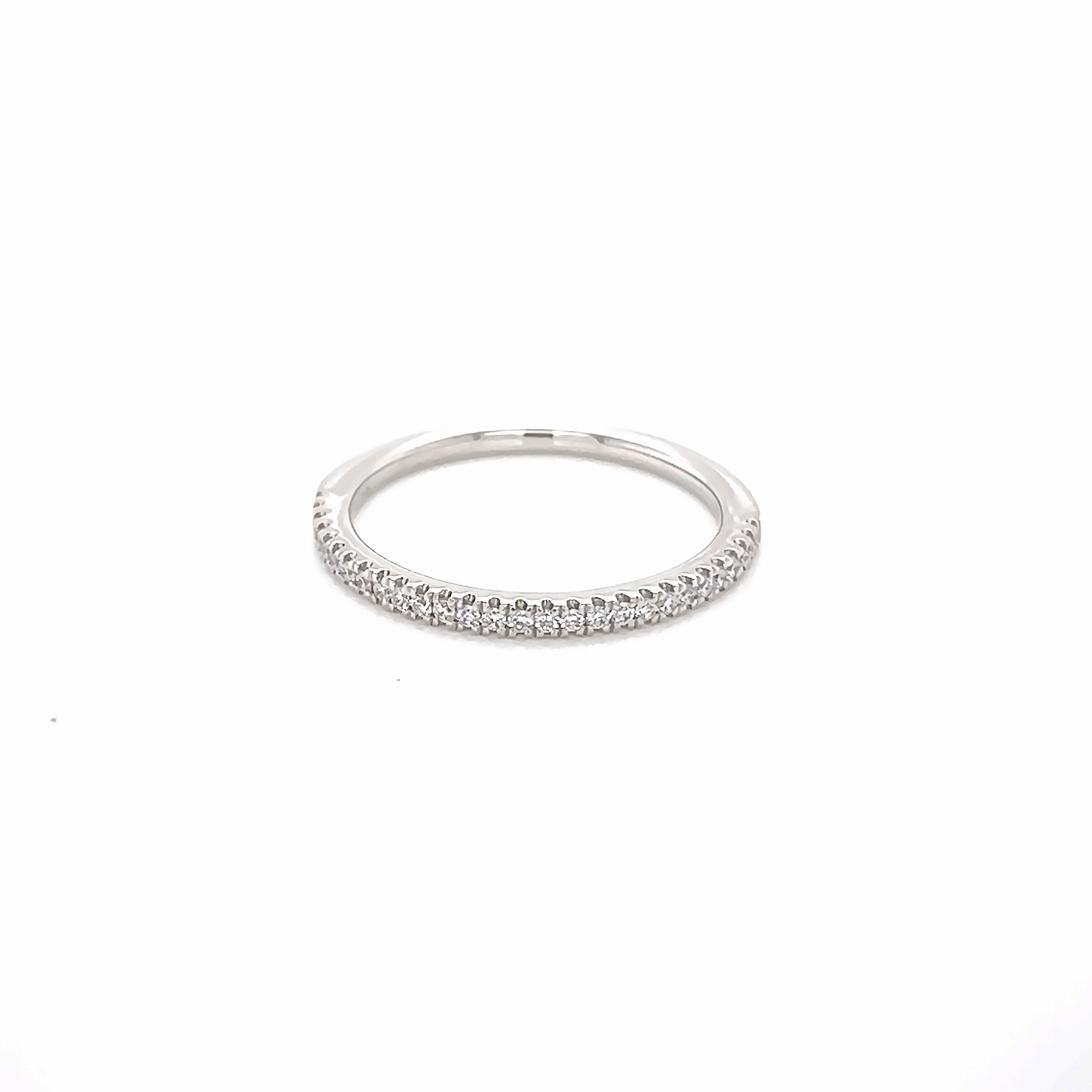 14 Karat white gold wedding band with 27=0.15 total weight round brilliant G VS Diamonds