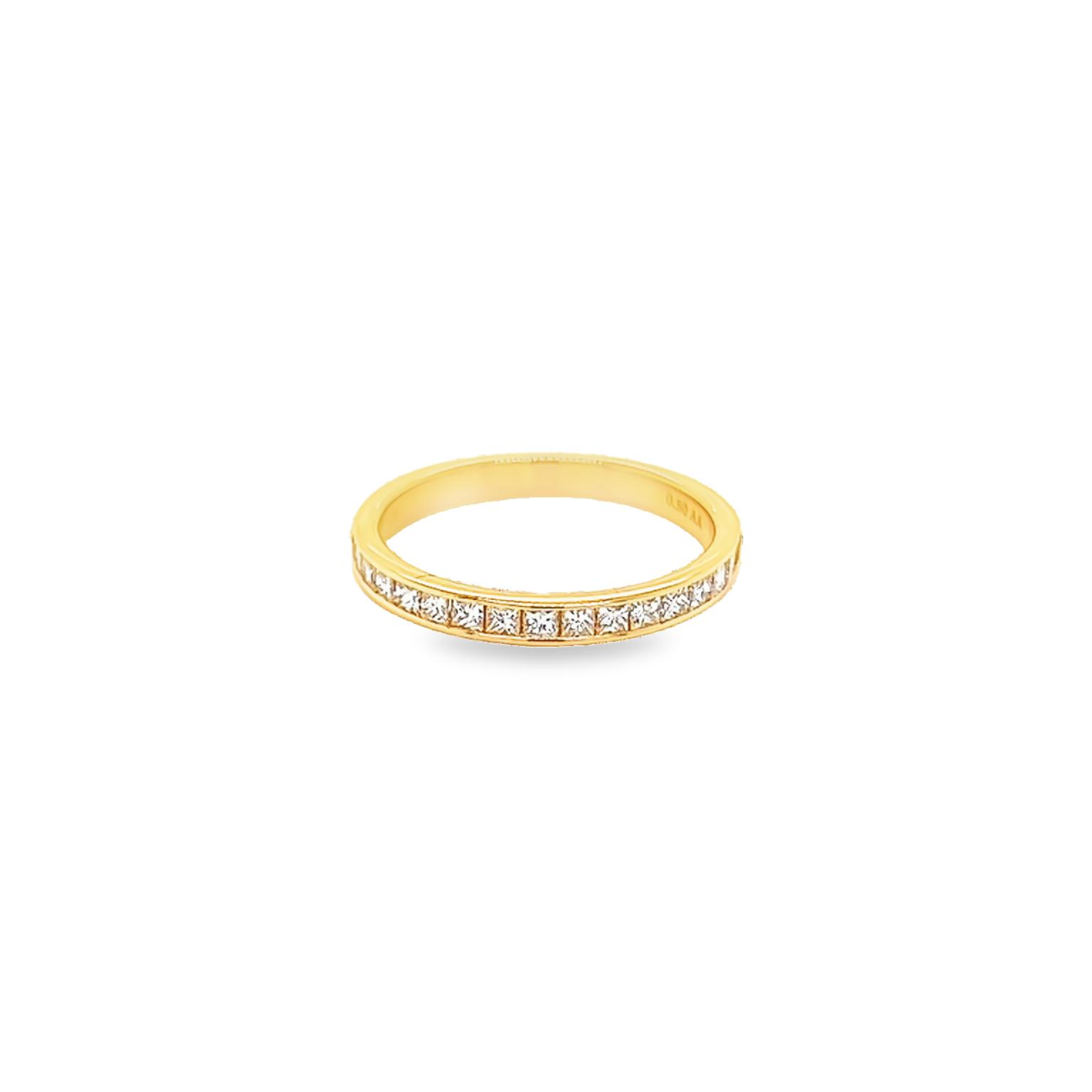 14 Karat yellow gold channel set wedding band Size 6.5 with 17=0.50 total weight princess G VS Diamonds