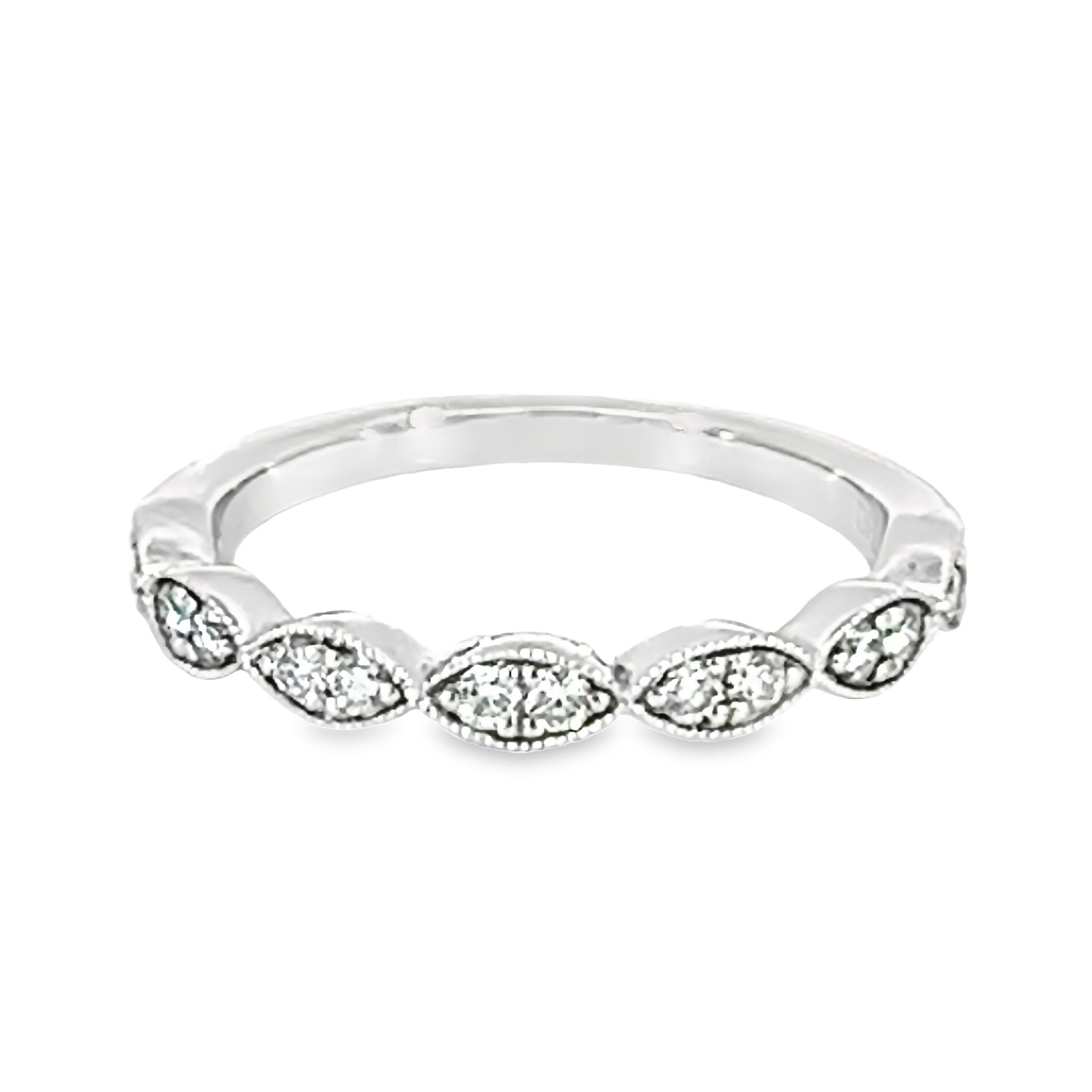 14 Karat white gold wedding band with 14=0.25Tw Round Brilliant G VS Diamonds.