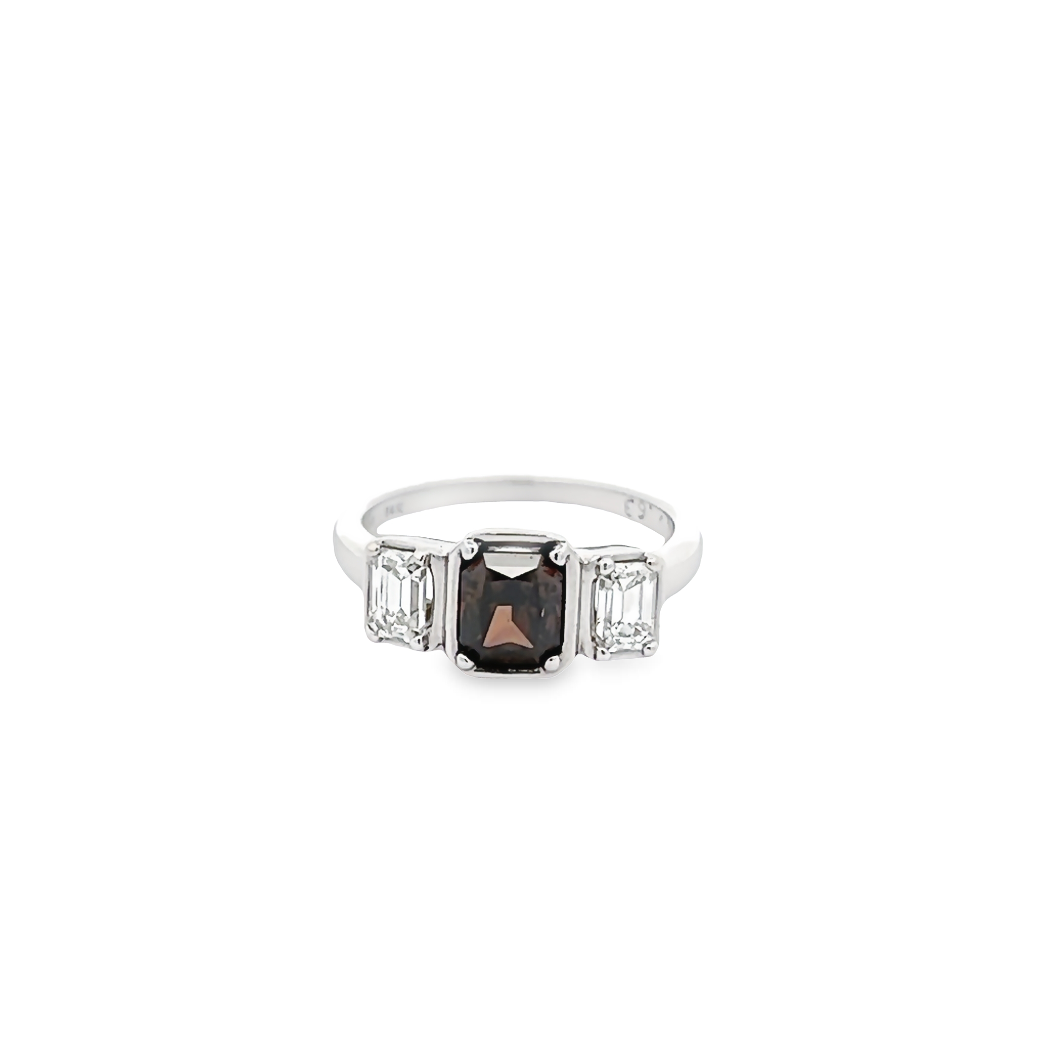 14 Karat three stone ring with One 1.01Ct rectangular cushion chocolate Diamond and 2=0.63 toal weight emerald G VS Diamonds
