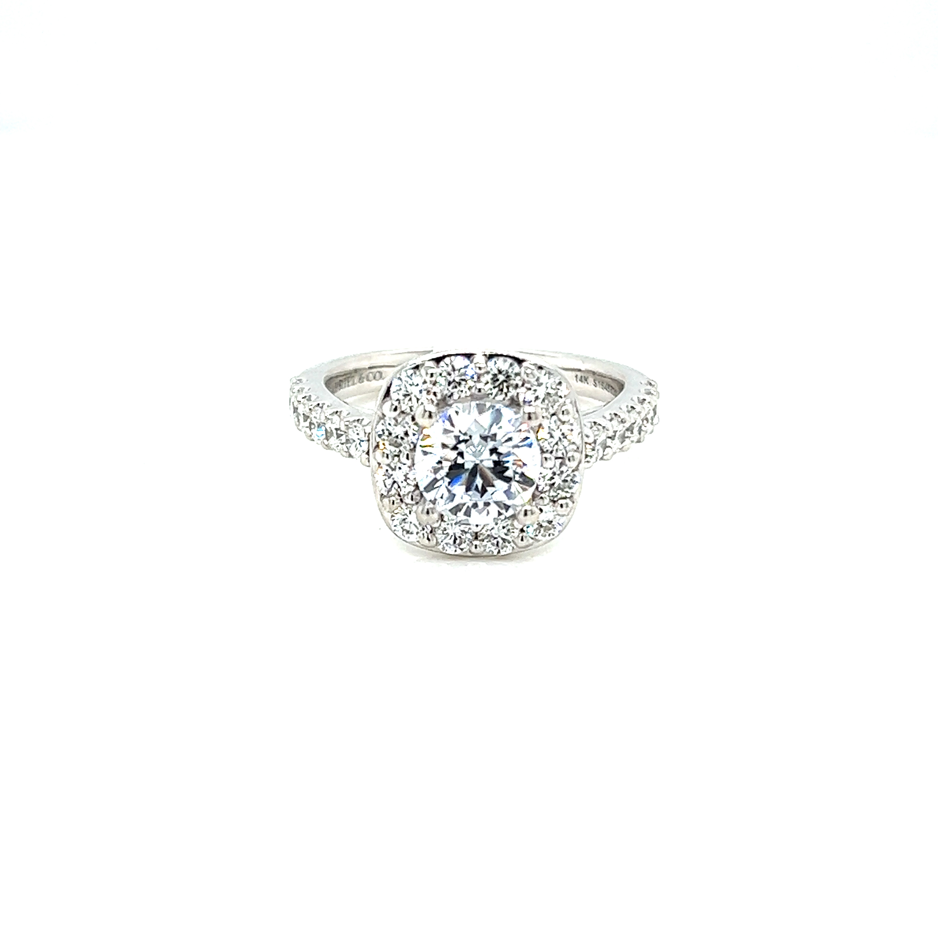 14 Karat white gold halo semi mount engagement ring with 24=0.91 total weight round brilliant G VS Diamonds
