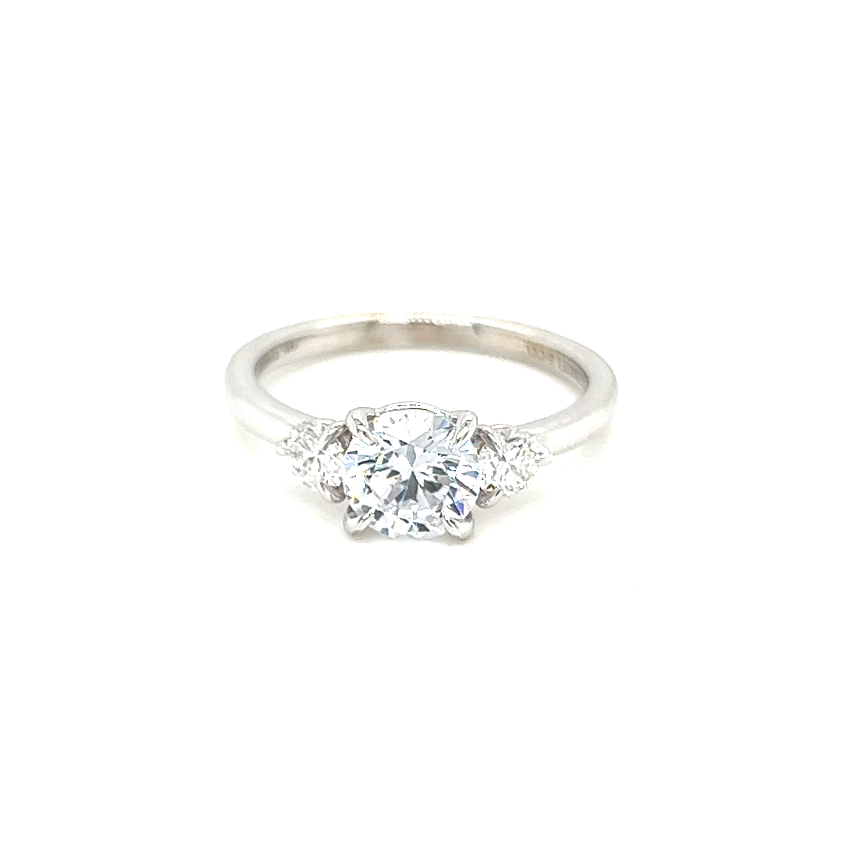 14 Karat white gold  semi mount engagement ring Size 6.5 with 2=0.34 total weight round brilliant G VS Diamonds