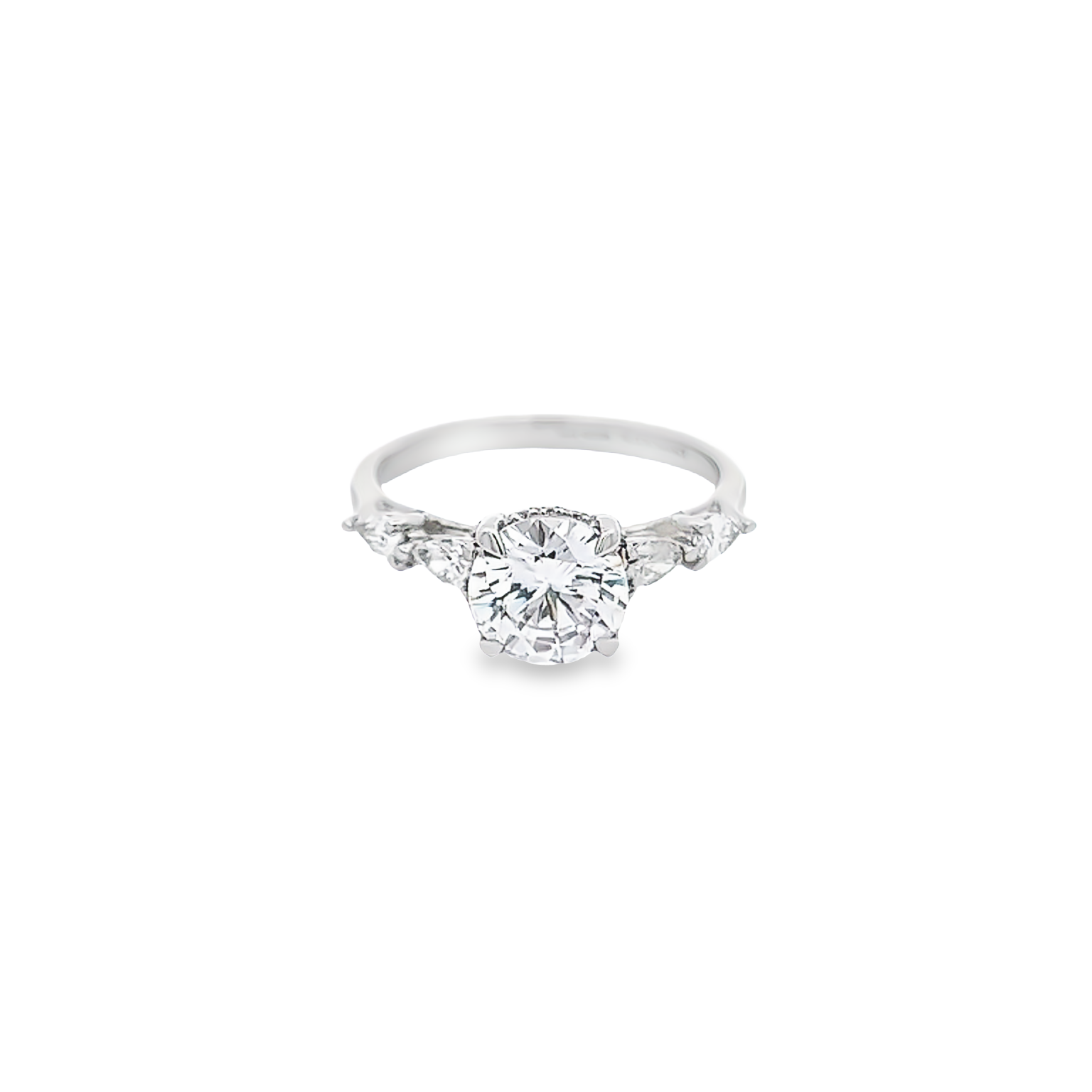 14 Karat white gold semi mount engagement ring with 16=0.54 total weight pear and round brilliant G Vs Diamonds. Size 7