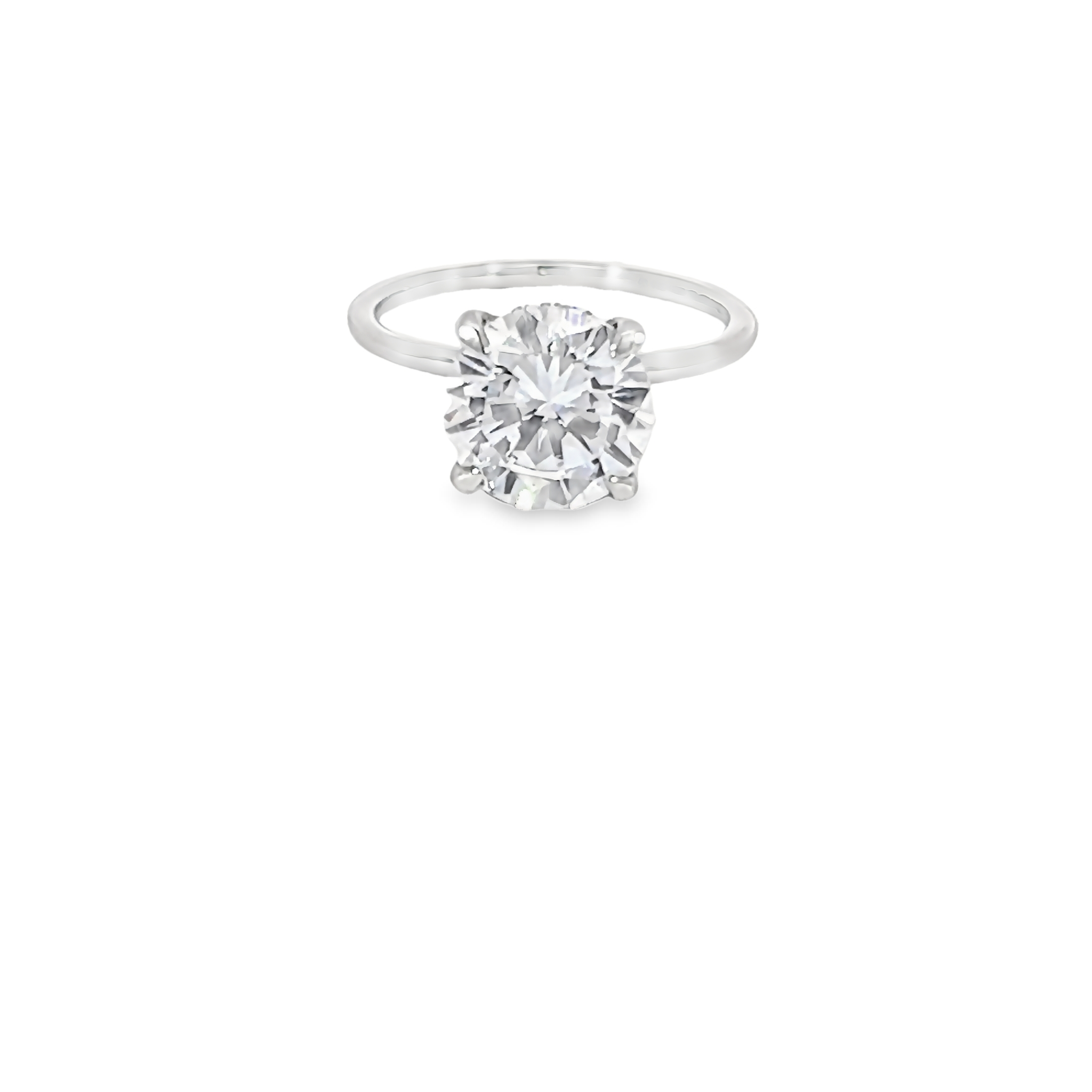 Platinum semi mount engagement ring with 16=0.13 total weight round brilliant G VS Diamonds. Size 7