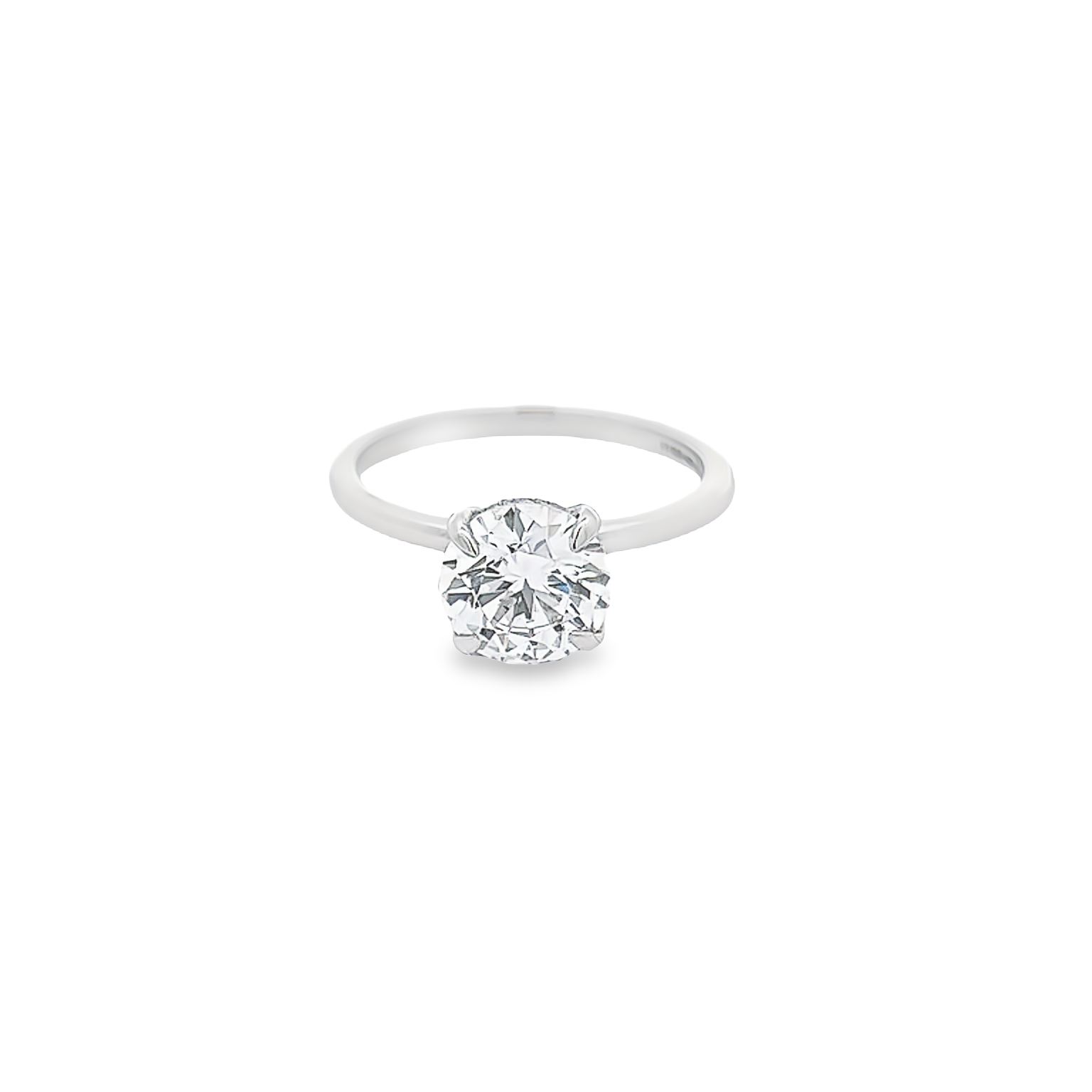 Platinum hidden halo semi mount engagement ring with 12=0.09 total weight round brilliant G VS Diamonds. Size 7
