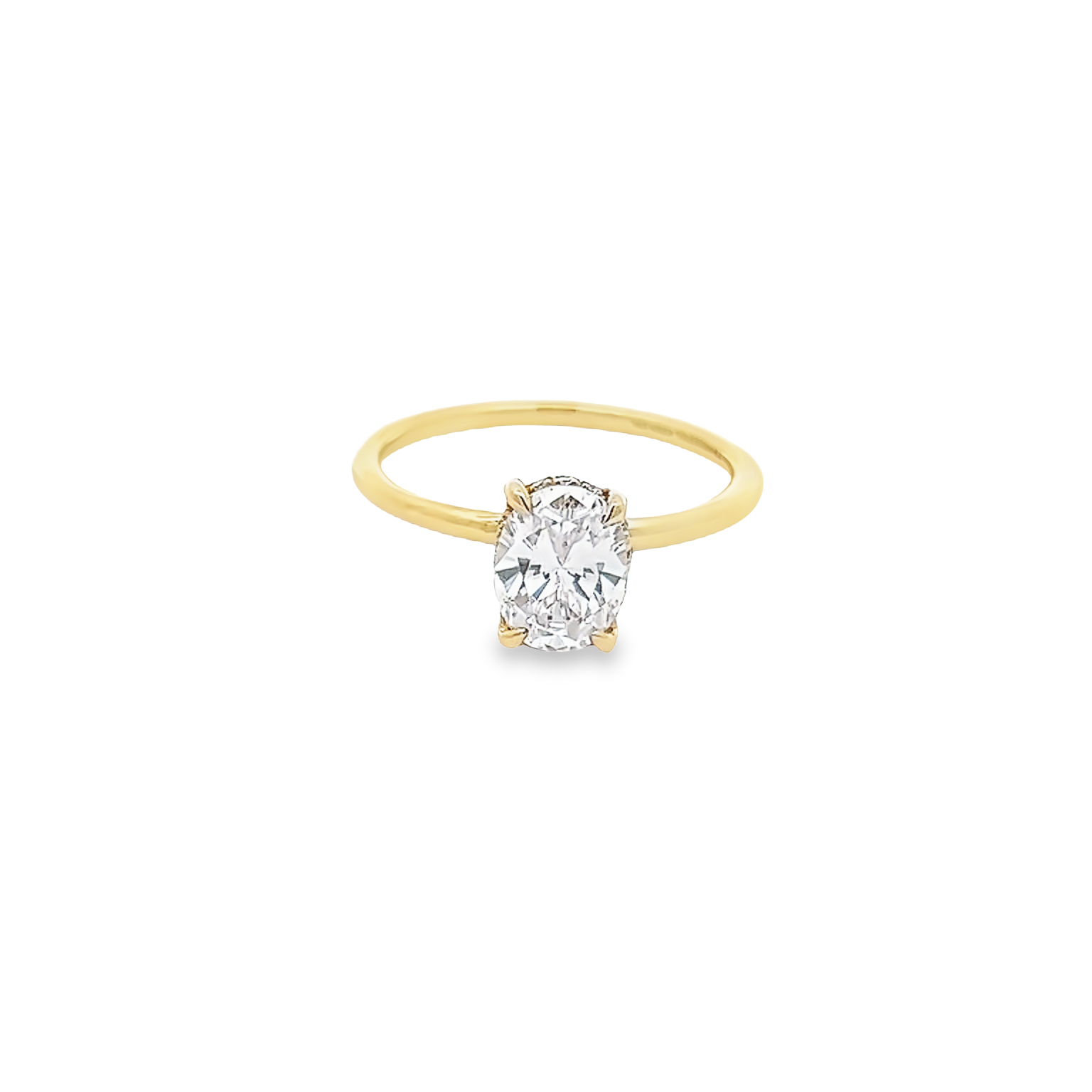 14 Karat yellow gold hidden halo semi mount engagement ring with 14=0.09 total weight round brilliant G VS Diamonds. Size 7