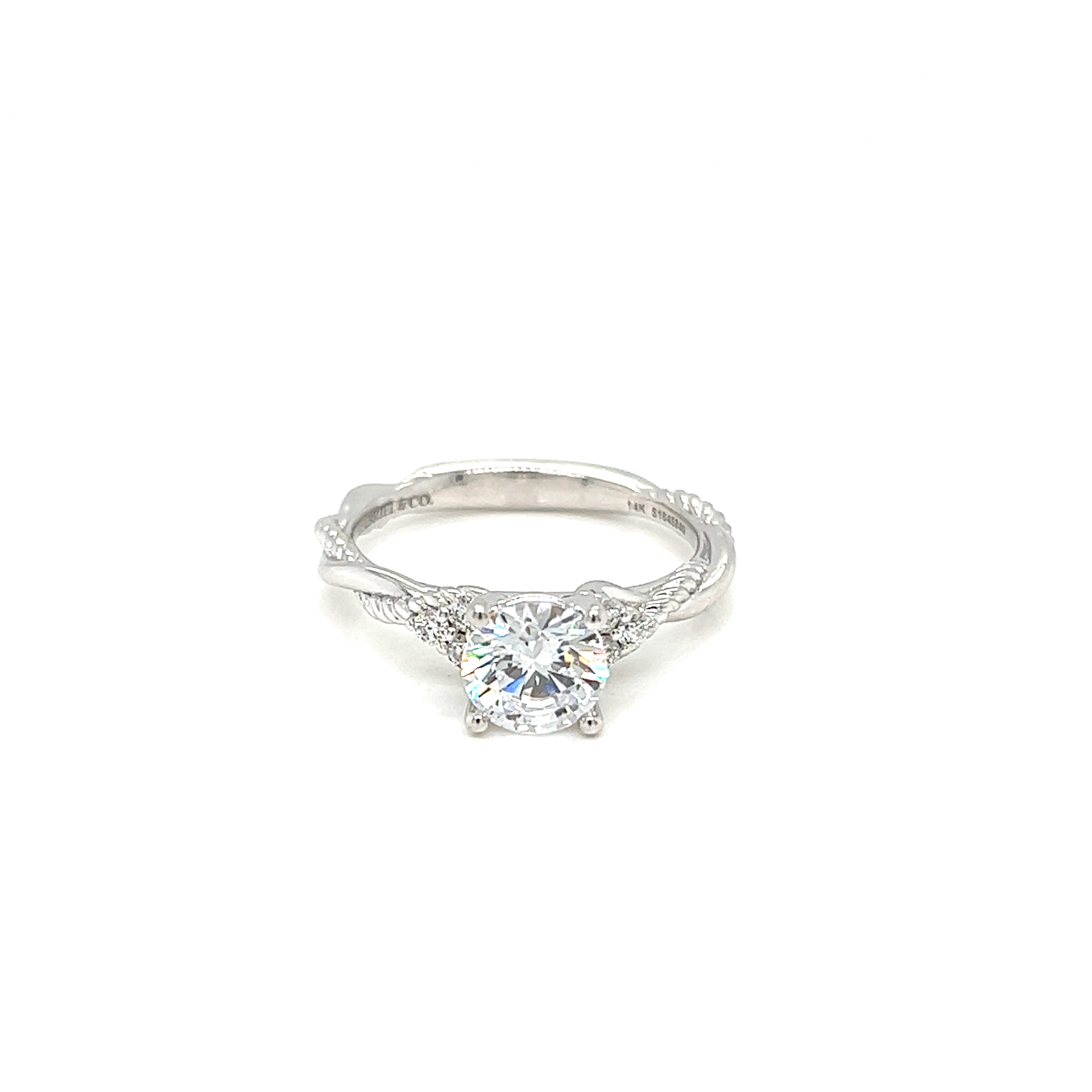 14 Karat white gold semi mount Infinity/Twist Ring with 6=0.13Tw Round Brilliant G Vs Diamonds. Size 6.5