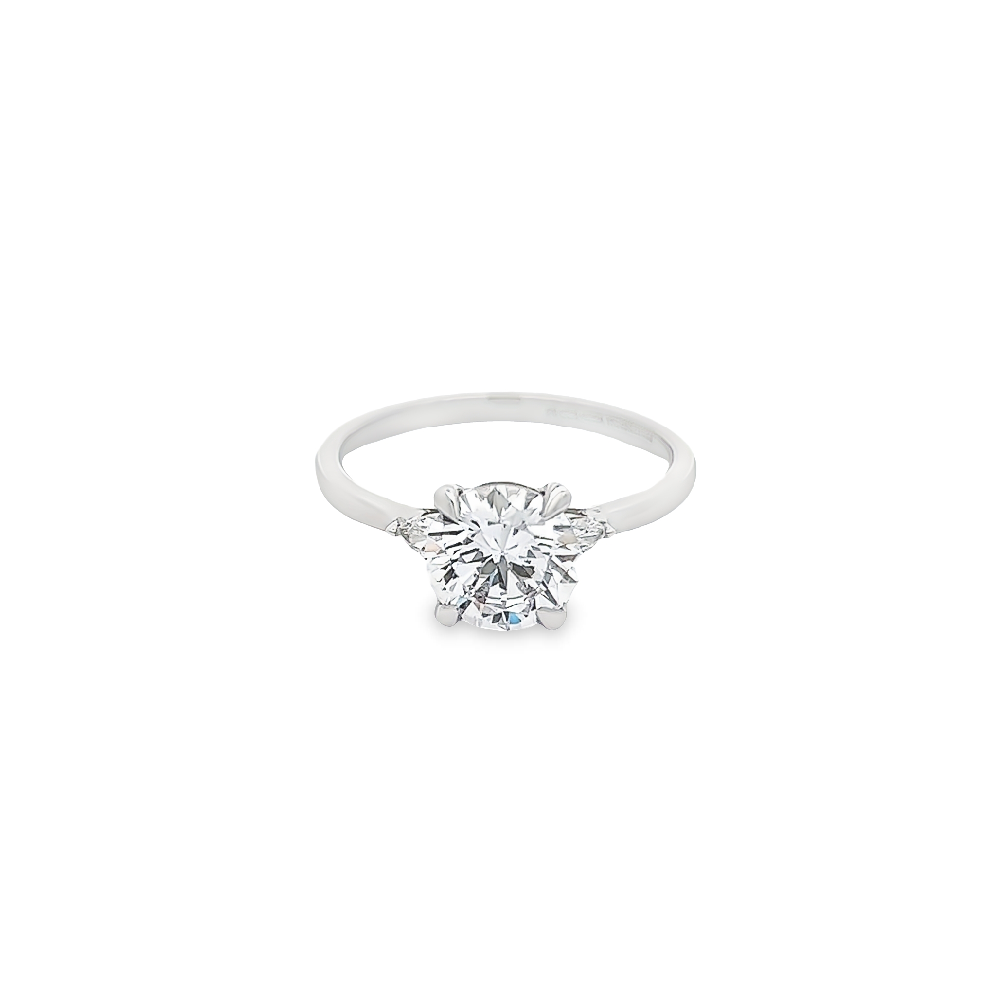 Platinum semi mount engagement ring with 4=0.19 total weight round brilliant and pear G VS Diamonds. Size 7