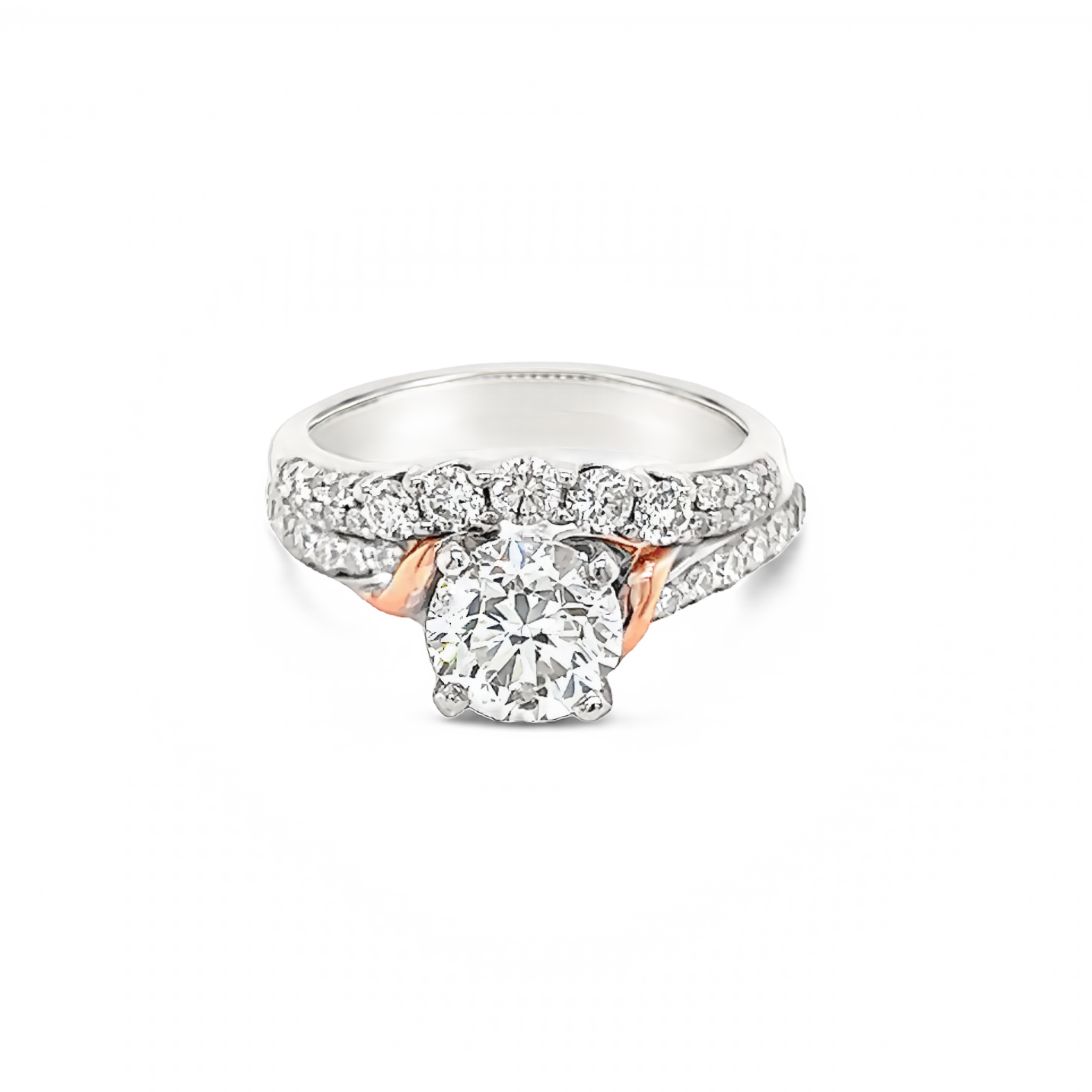 14 Karat white gold wedding set with rose gold trim with One 1.40ct Round Brilliant J I1 Diamond And  39=1.00tw Round Brilliant G SI Diamonds