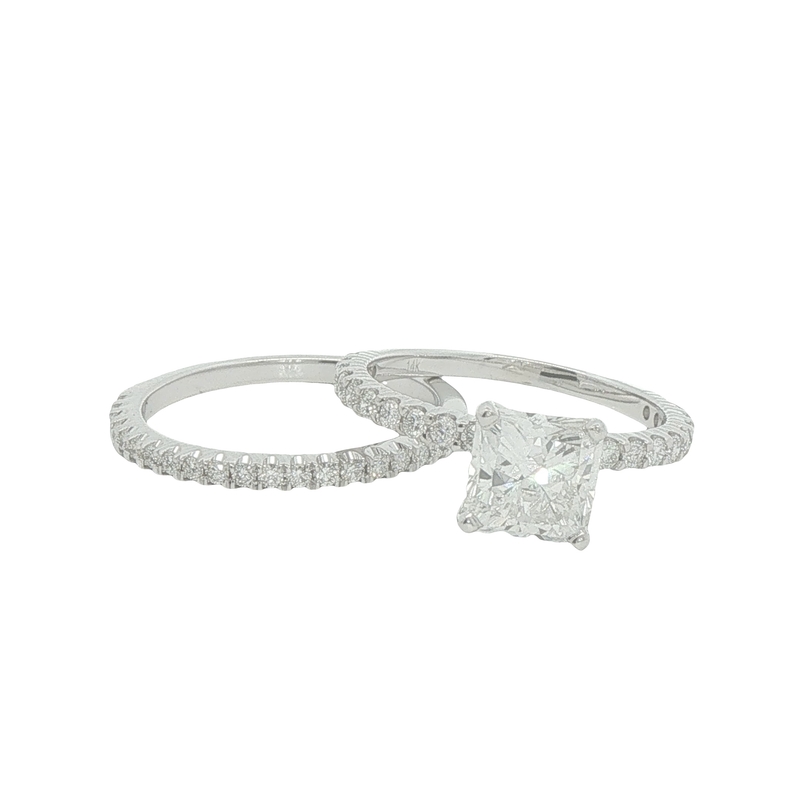 Lady's White 14 Karat Wedding Set.  One 1.51ct Radiant I Si2 Diamond, Gia 6371990895 With
41 = 0.70twt Round Brilliant G Vs Diamonds Are Set In Engagement Ring & Wedding Band.