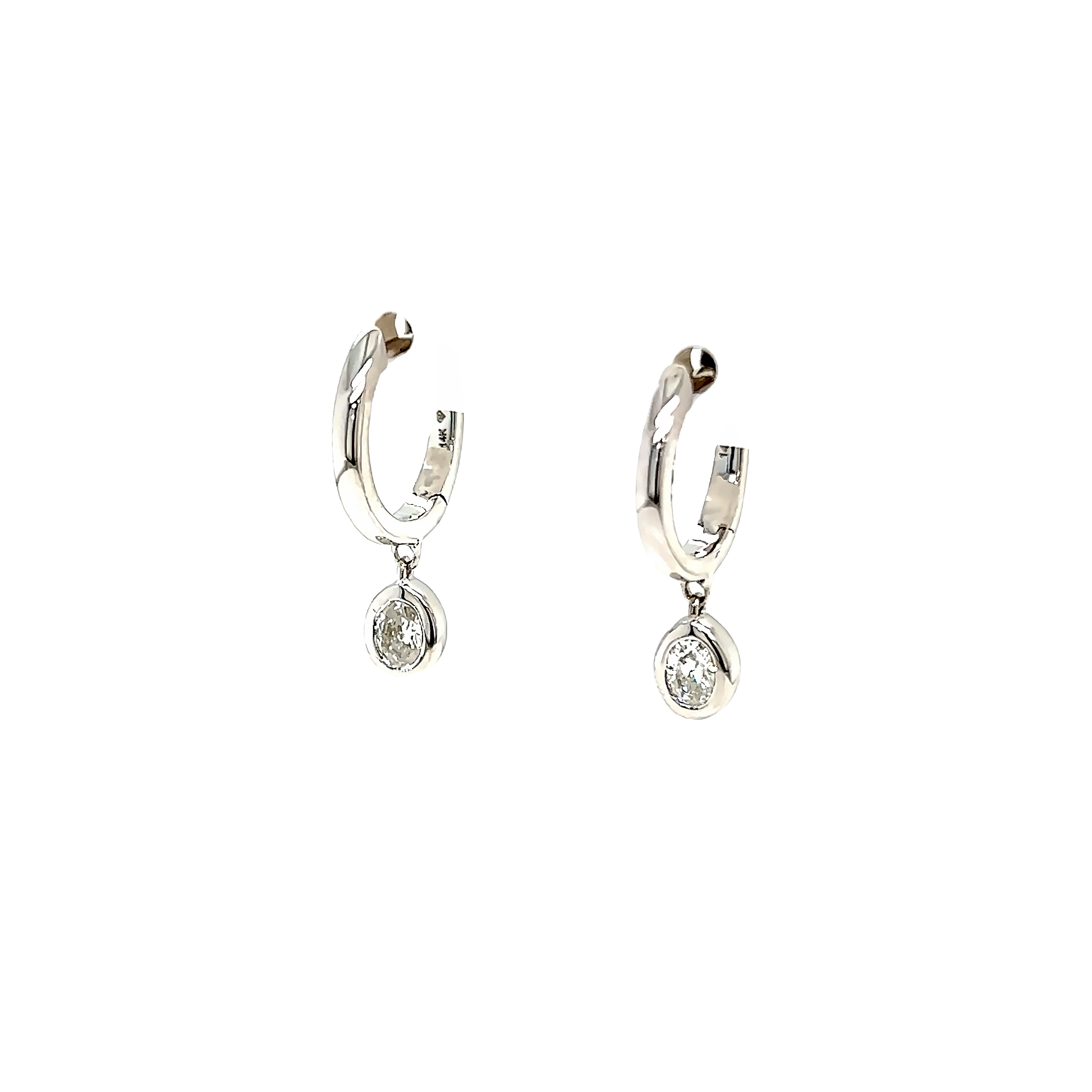 14 Karat white gold diamond dangle earrings with 2=0.30 total weight oval G I Diamonds