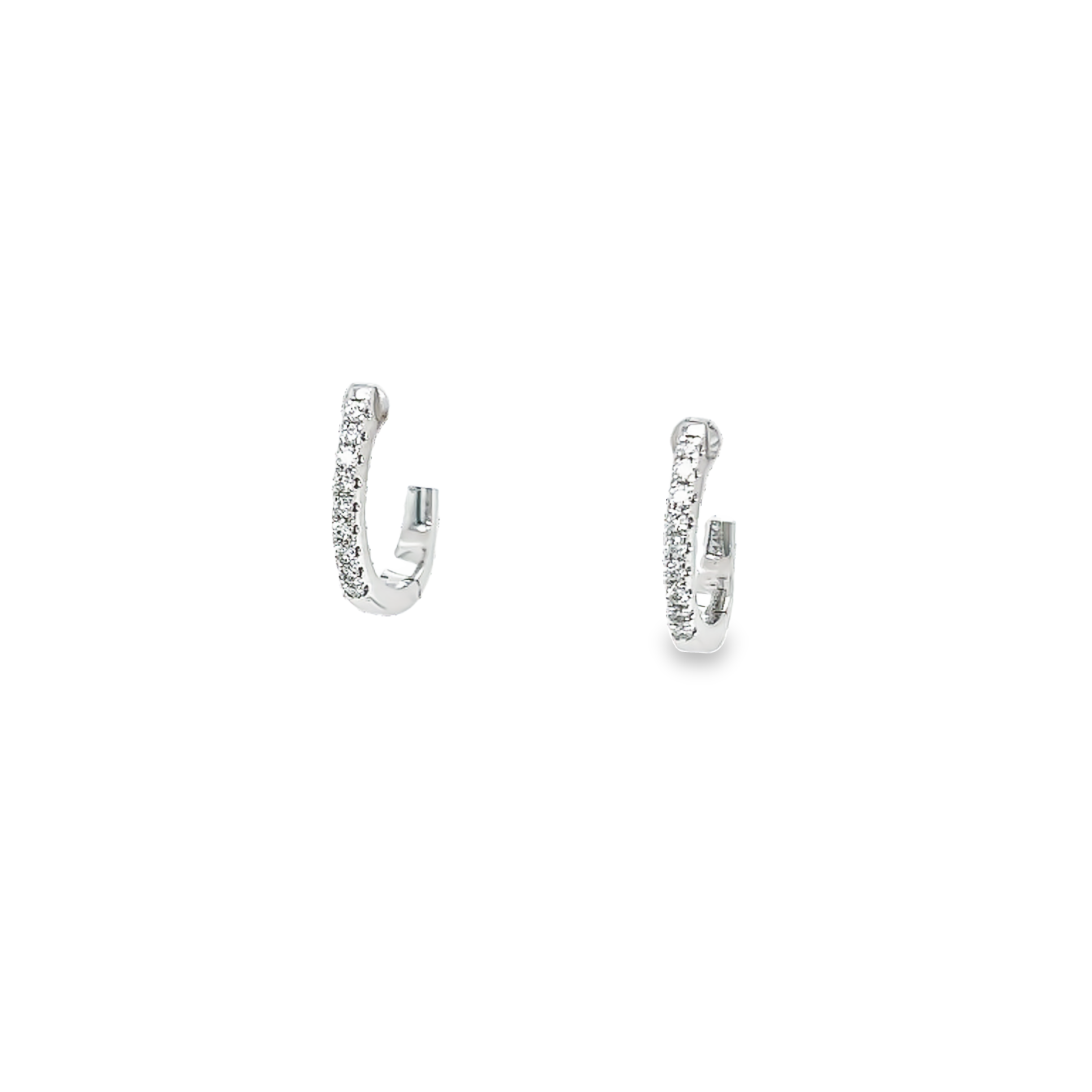 14 karat white gold huggie earrings with 18=.09 total weight round brilliant Diamonds with G color and SI clarity.