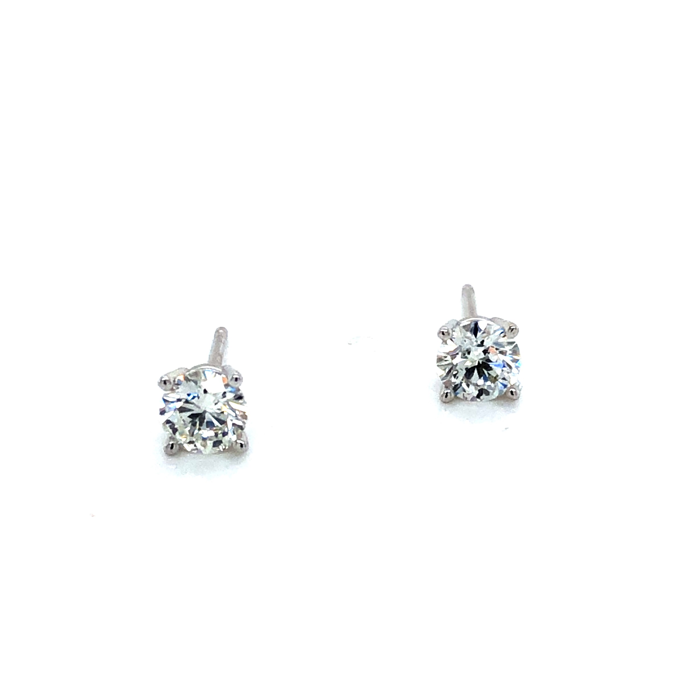 4-prong White 14 Karat Earrings With 2=0.72Tw Round Brilliant G I1 Diamonds