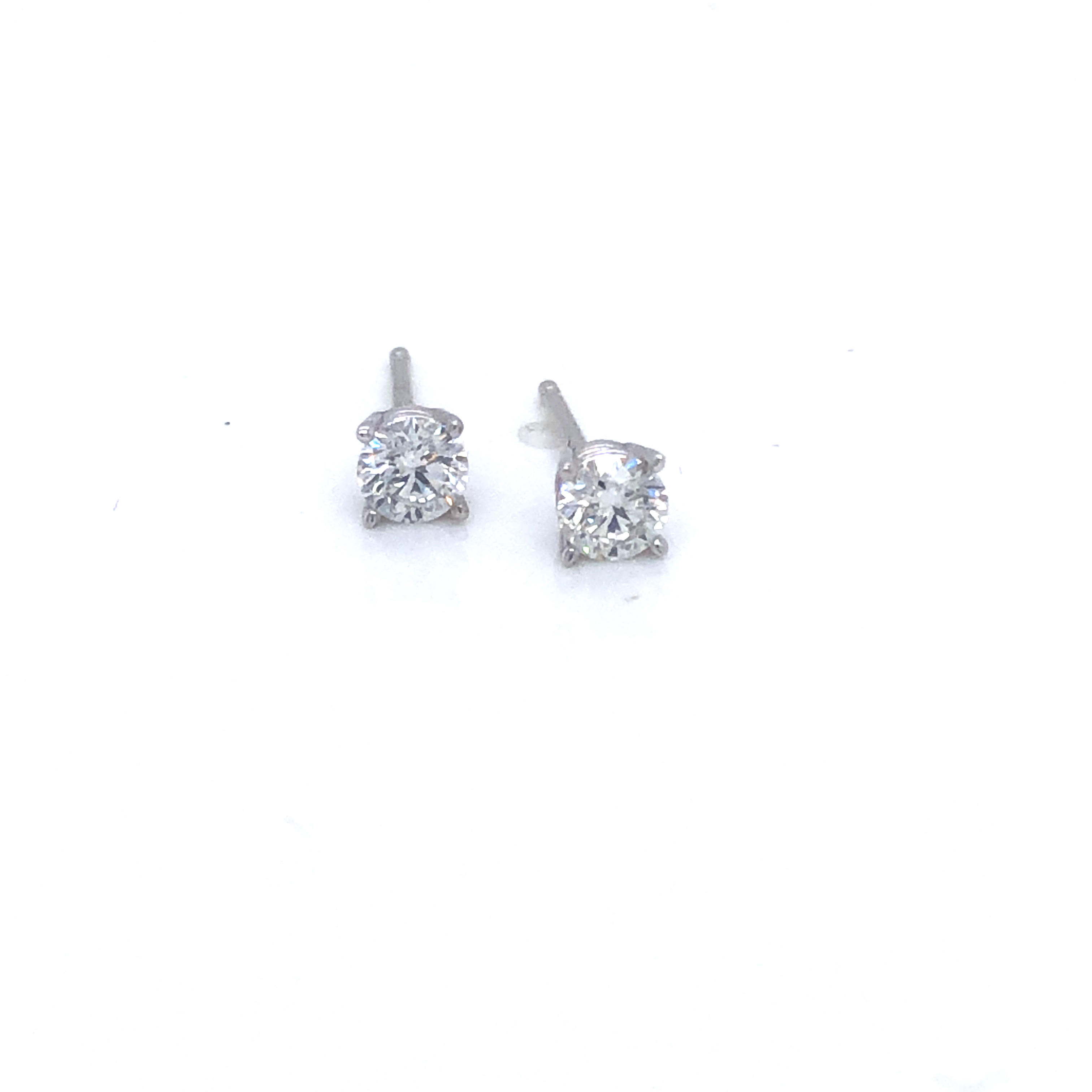 14 Karat white gold earrings With 2=0.43Tw Round Brilliant J SI2 Diamonds