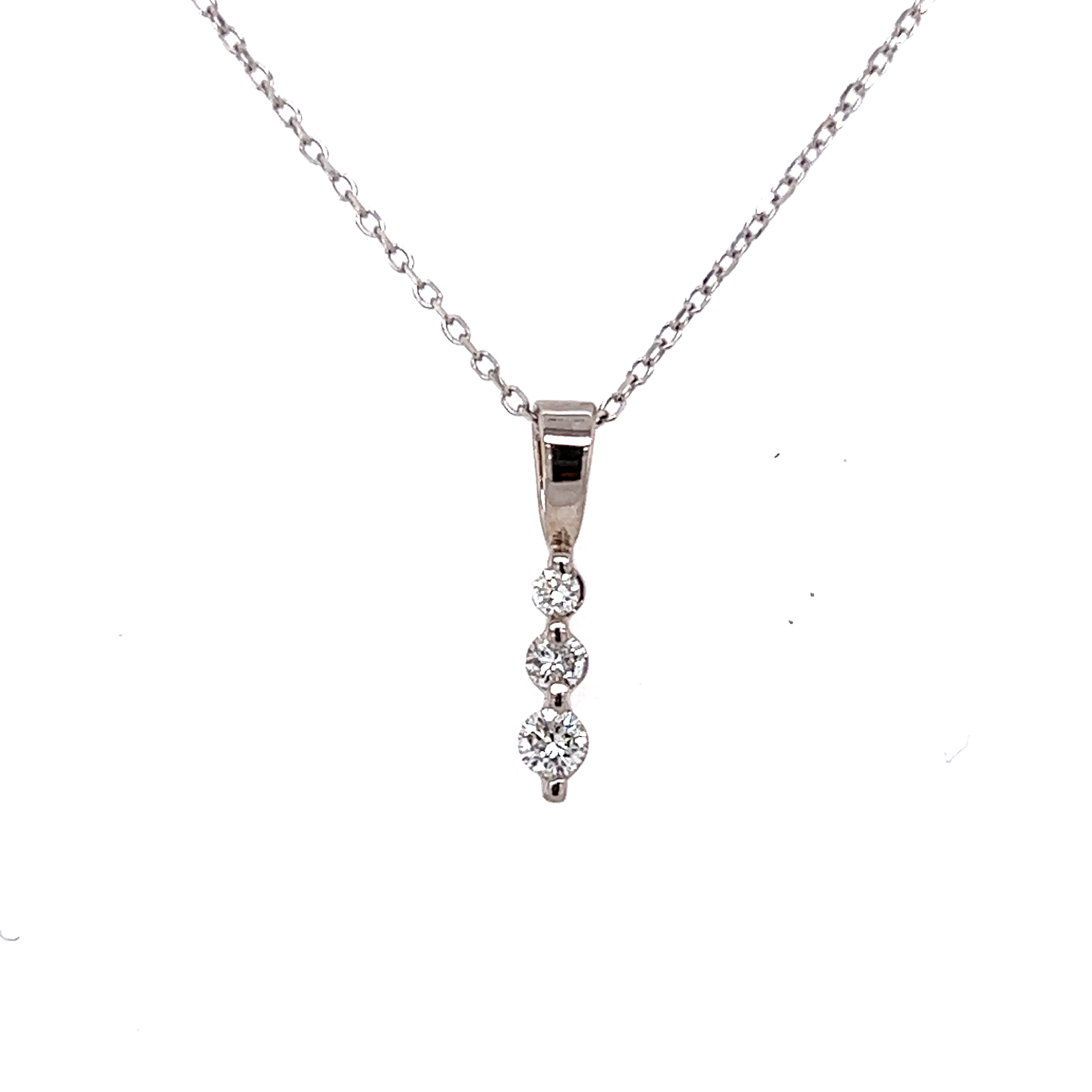 14 Karat white gold diamond pendant with 3=0.12Tw Round Brilliant G VS Diamonds  Dwt: 0.64
