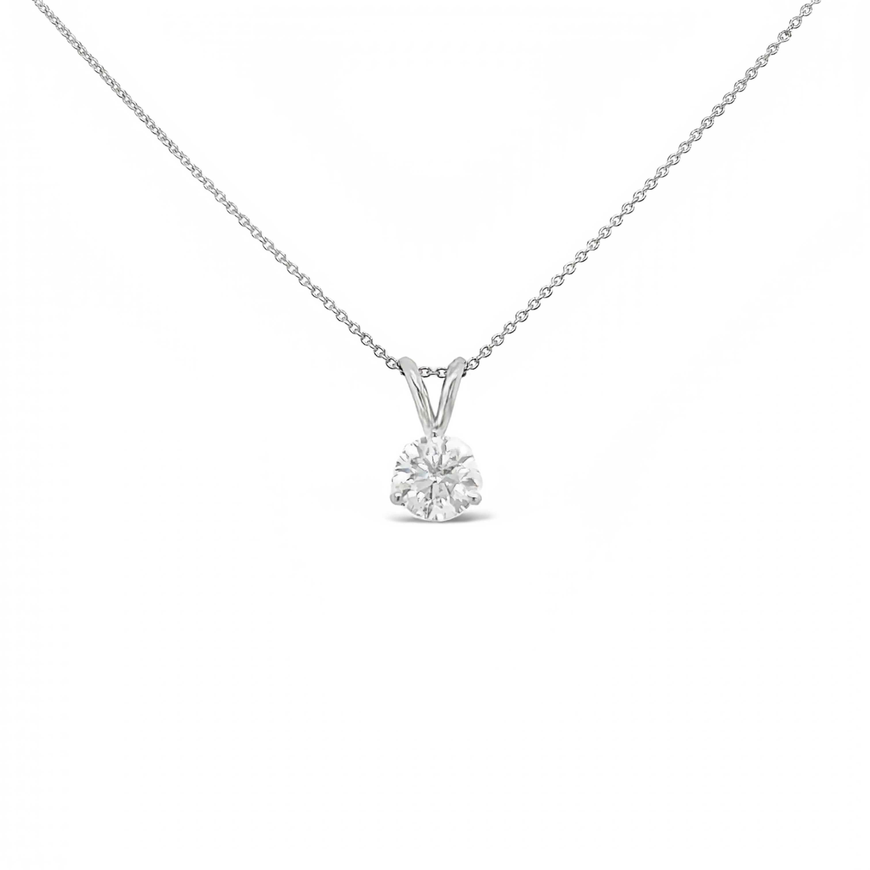 14 Karat white gold solitaire pendant with One 1.00Ct Round Brilliant J I2 Diamond
