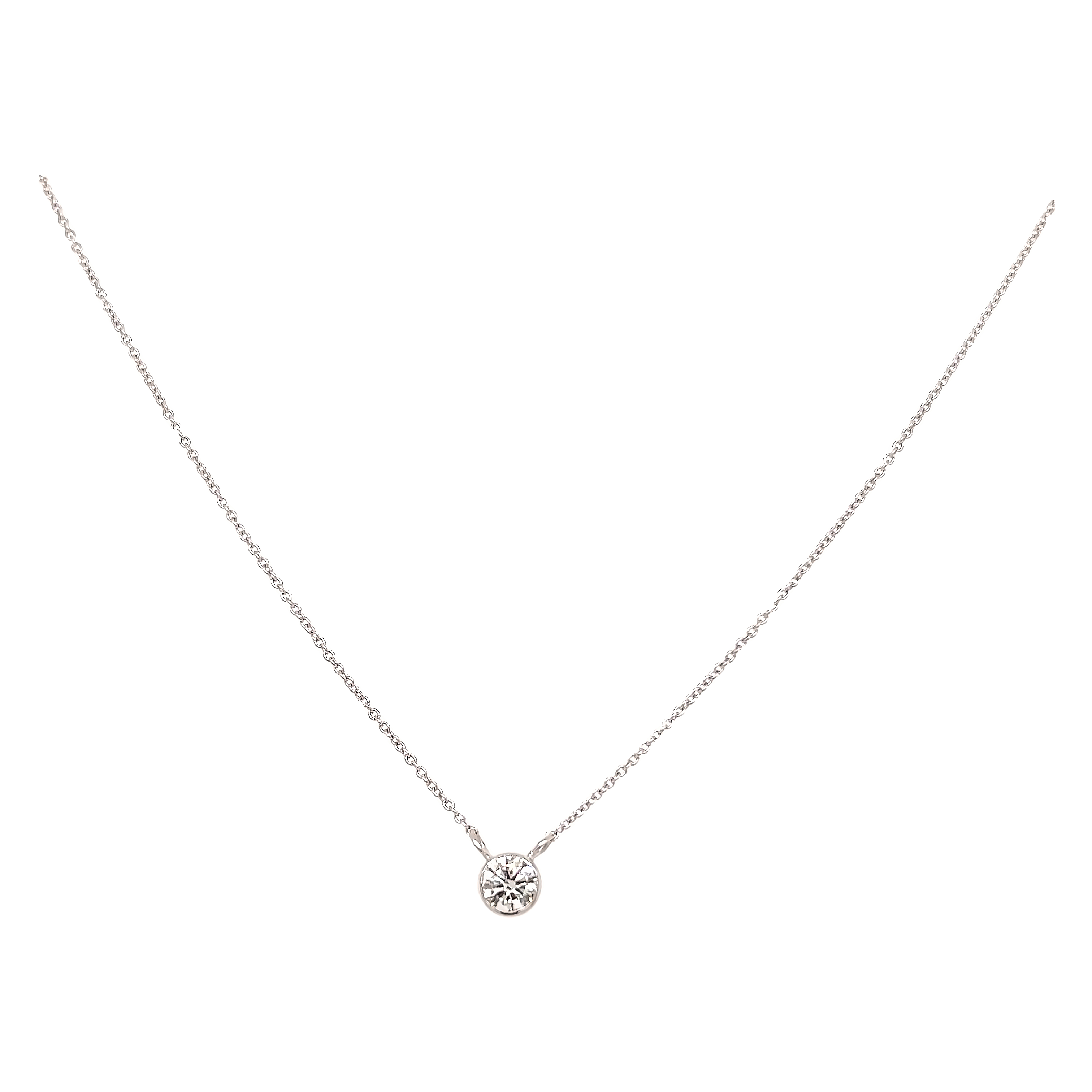 14 Karat white gold solitaire pendant Length 18 with One 0.30ct Round Brilliant G SI Diamond
