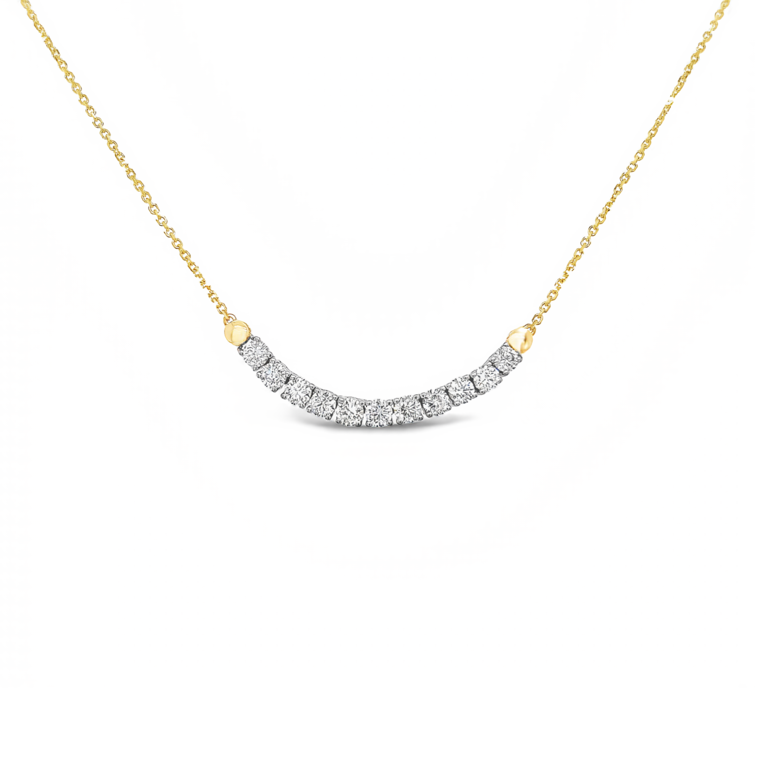 14 Karat yellow gold curved bar necklace with 11=0.97tw Round Brilliant G VS Diamonds