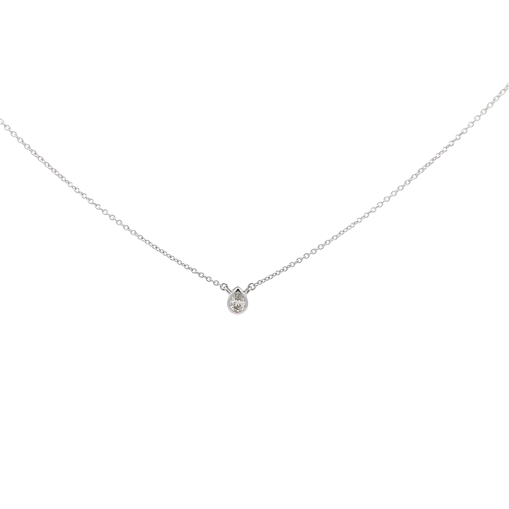 14 Karat white gold bezel set solitaire necklace with One 0.10Ct pear I VS Diamond