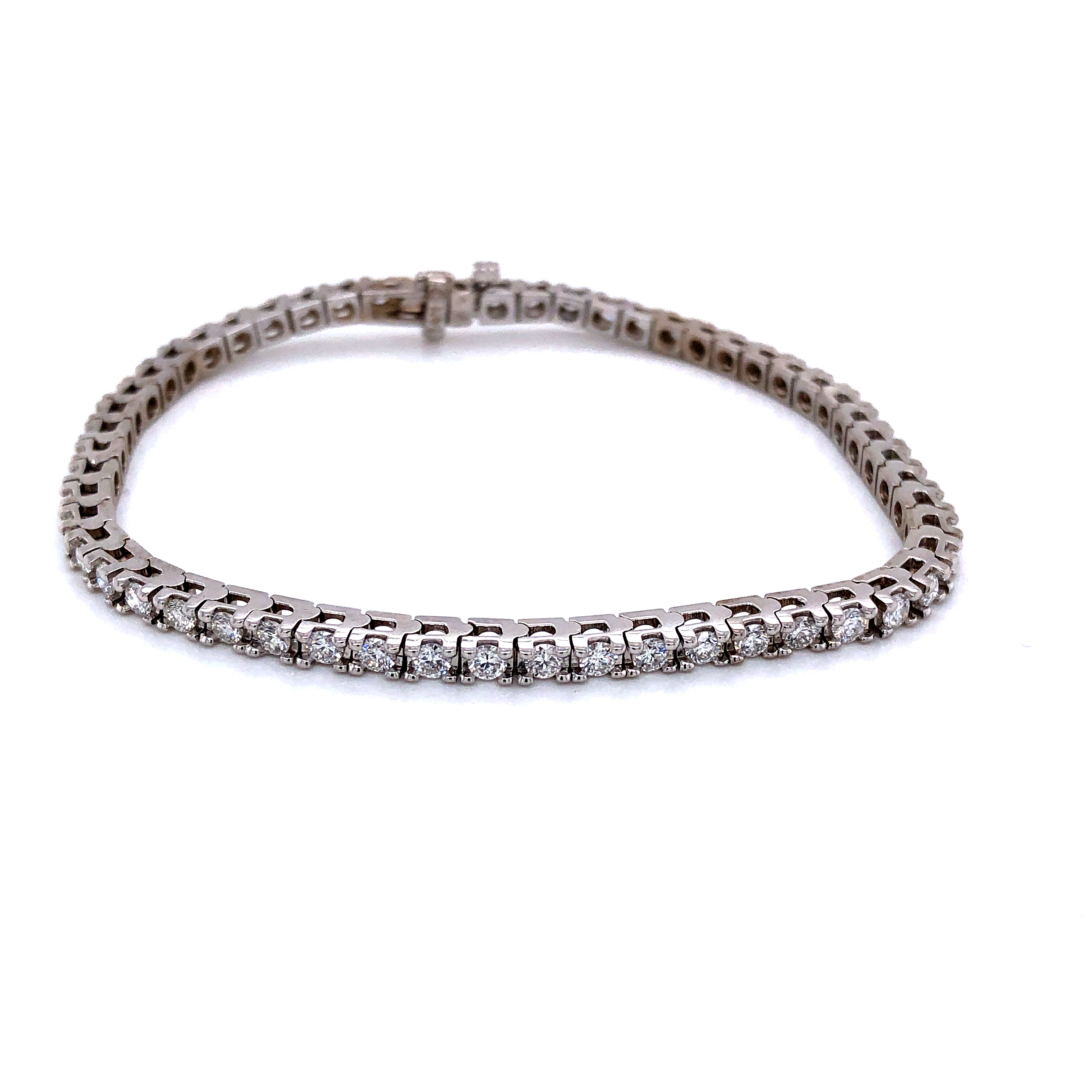 14 Karat white gold tennis bracelet with 55=3.03 total weight Round Brilliant G VS Diamonds