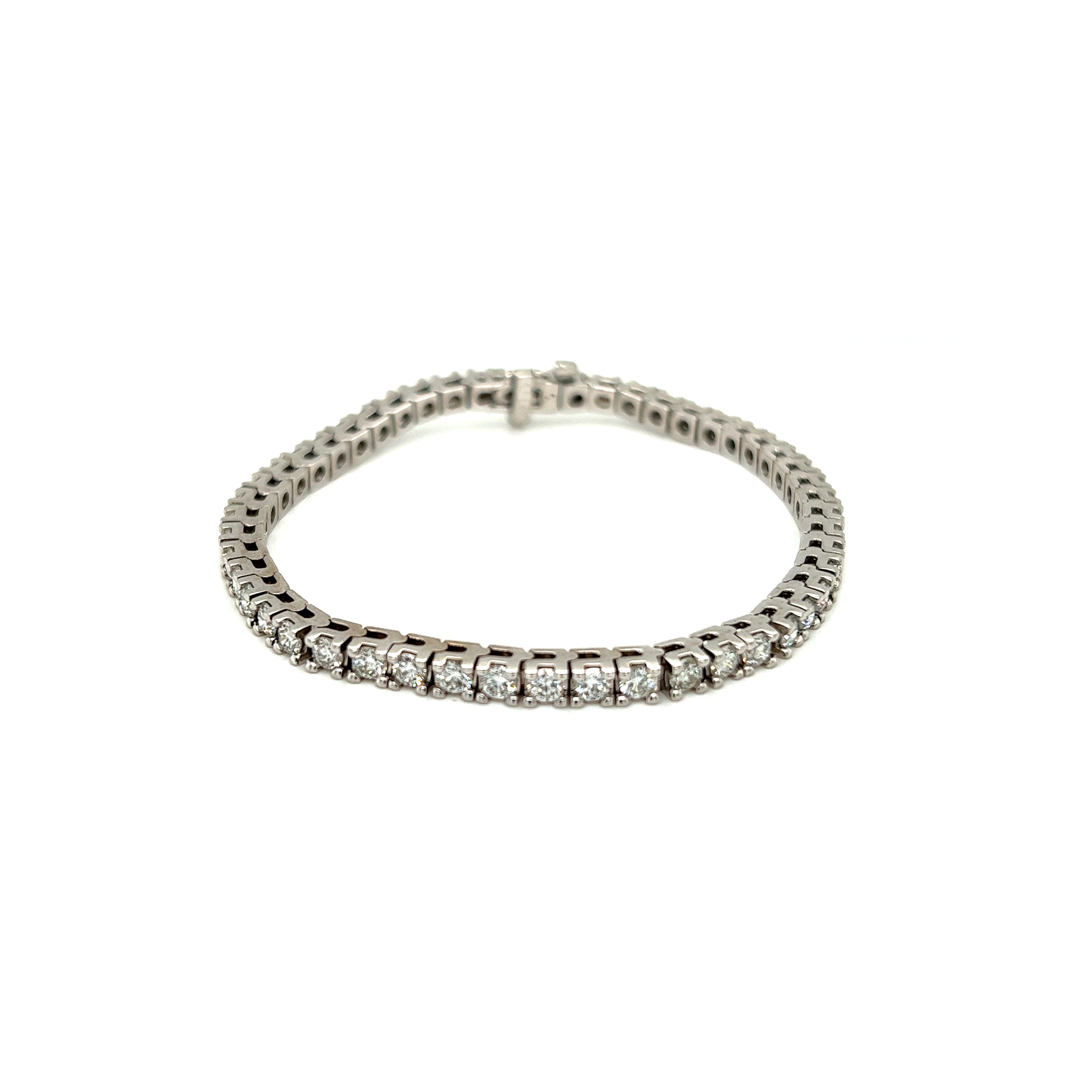 White 14 Karat tennis Bracelet with 50=5.04tw Round Brilliant G VS Diamonds