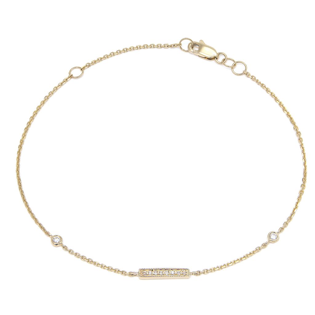 14 karat yellow gold bar bracelet with 10=0.06tw single cut G I Diamonds