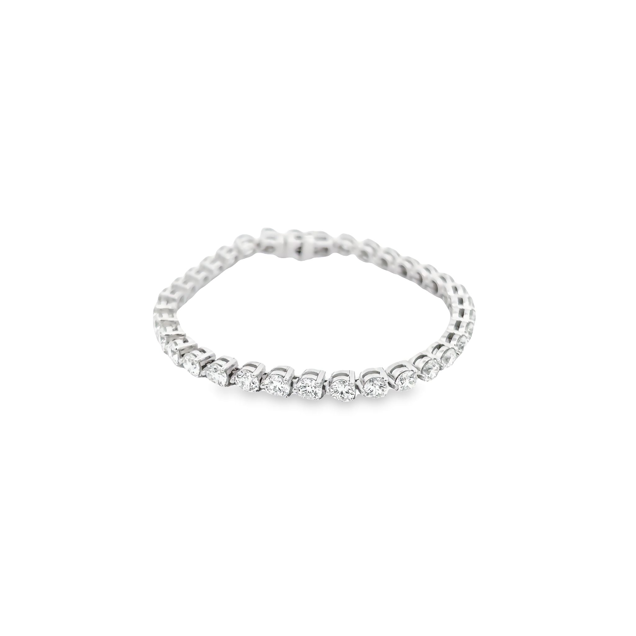Platinum tennis bracelet with 34=10.29 total weight round brilliant F VVS Diamonds