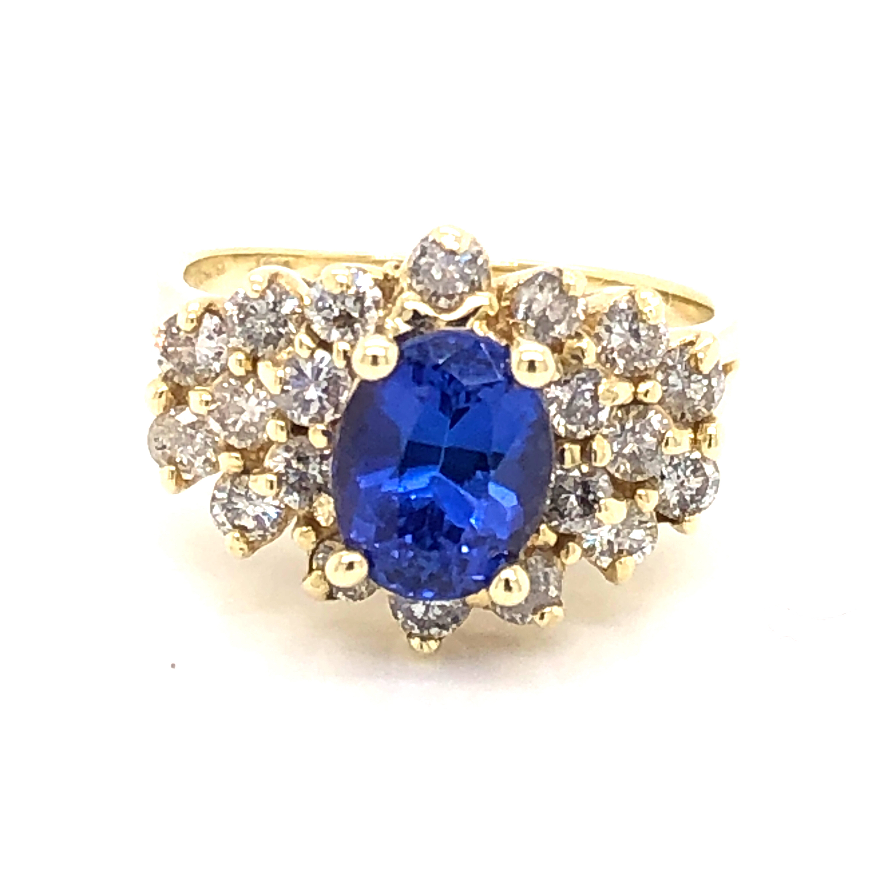 Yellow 14 Karat Fashion Ring With One 7.90X6.40mm Oval Tanzanite And 20=0.80ctw Round Brilliant G I Diamonds  dwt: 4