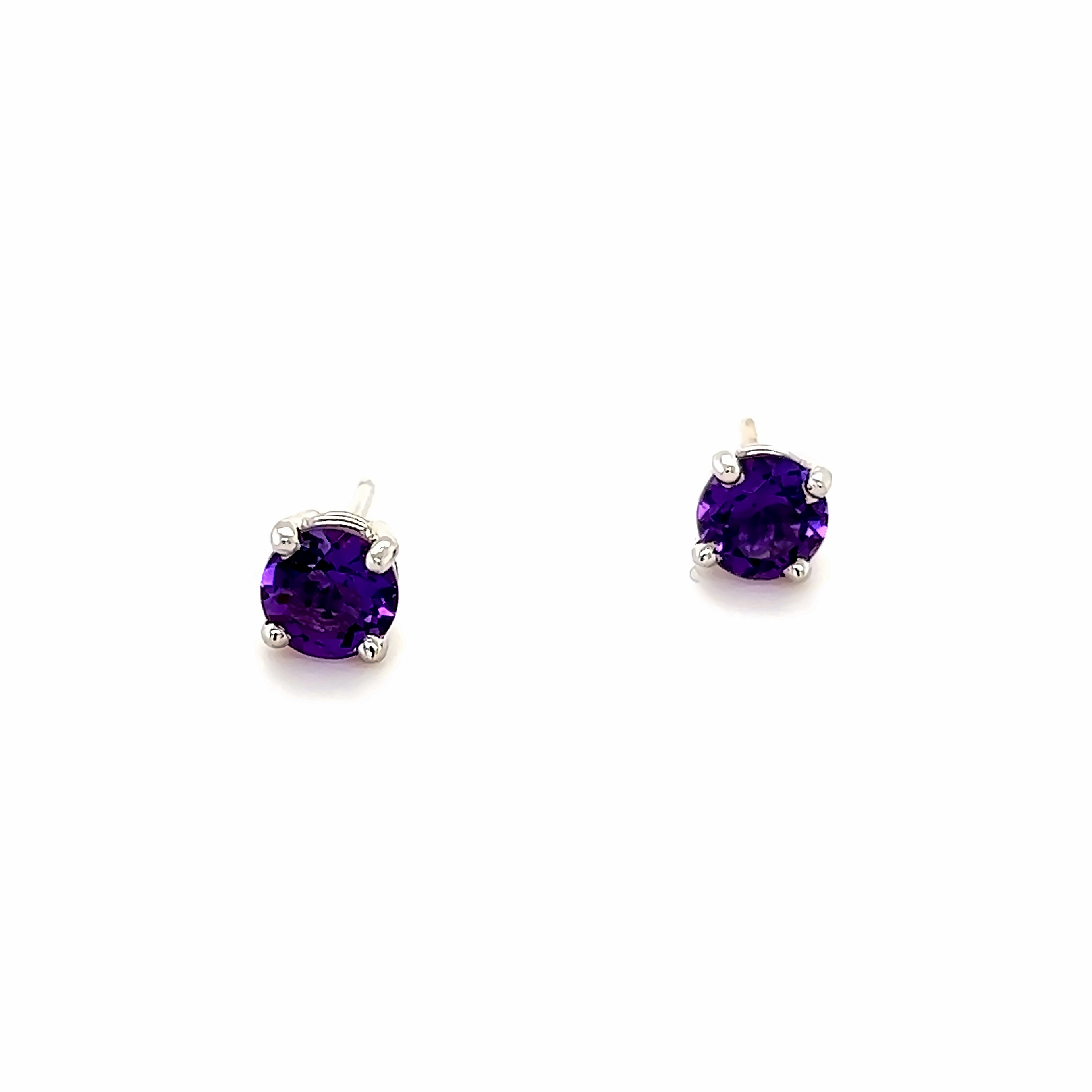 14 karat white gold stud earrings with 2=5.00mm round mixed cut Amethysts.
