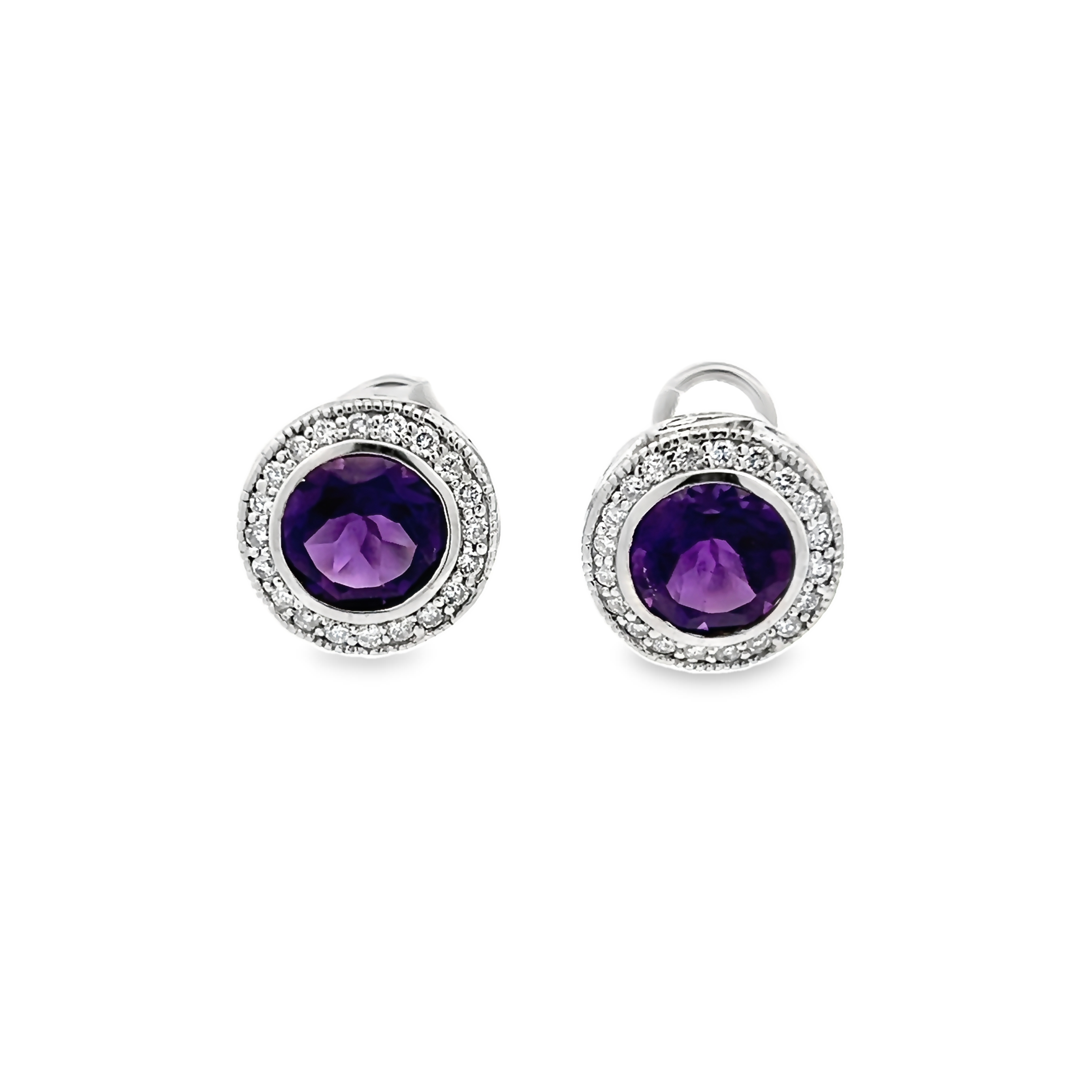 14 Karat white gold clip on earrings with two= 3.80 total weight round mixed cut Amethysts and 40=0.50 total weight round brilliant G VS Diamonds