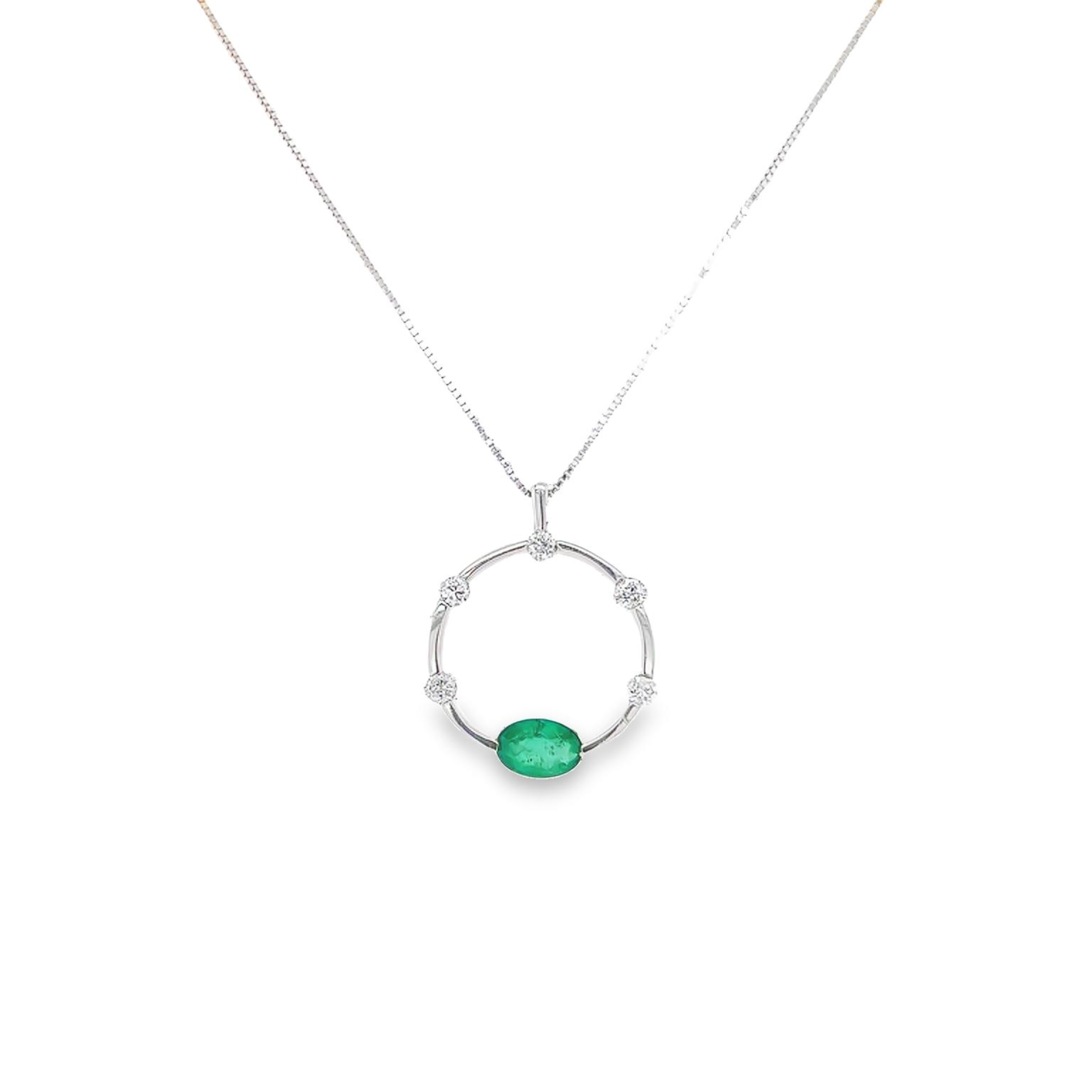 14 Karat white gold circle pendants with One 0.50Ct oval Emerald and 5=0.20 total weight round Brilliant G SI Diamonds