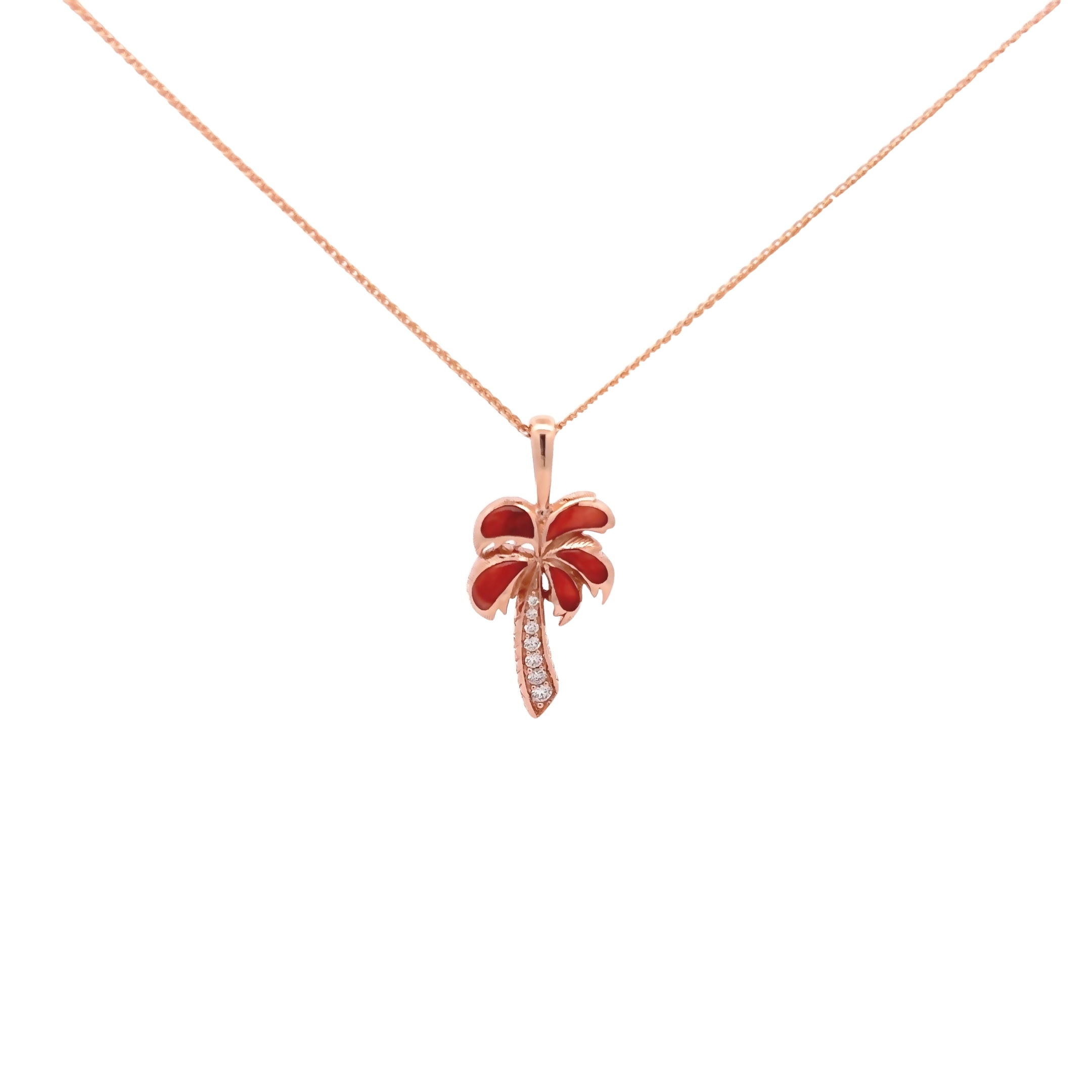 14 Karat rose gold palm tree pendant with red spiny oyster inlay and 7=.12 total weight round brilliant G VS Diamonds
