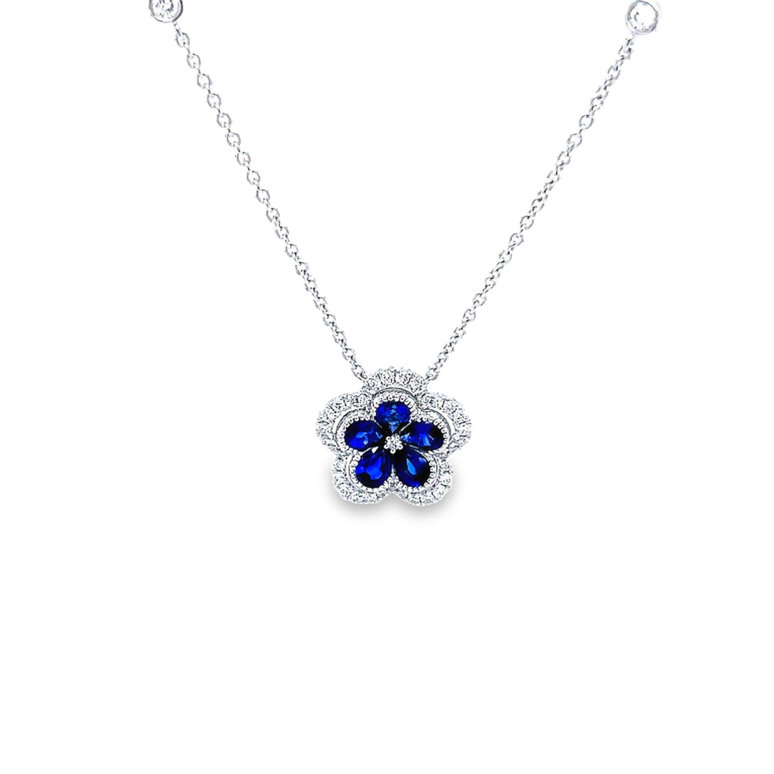 14 Karat white gold flower necklace with 5=0.90 total weight pear Sapphires and 40=0.29 total weight round brilliant G VS Diamonds