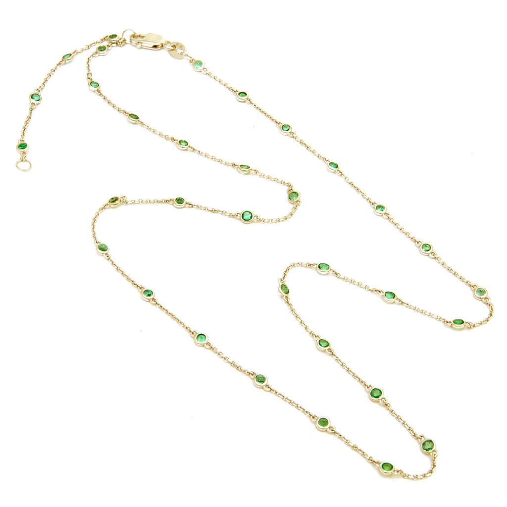 14 Karat yellow gold station necklace with 33=1.45total weight round mixed cut Emeralds