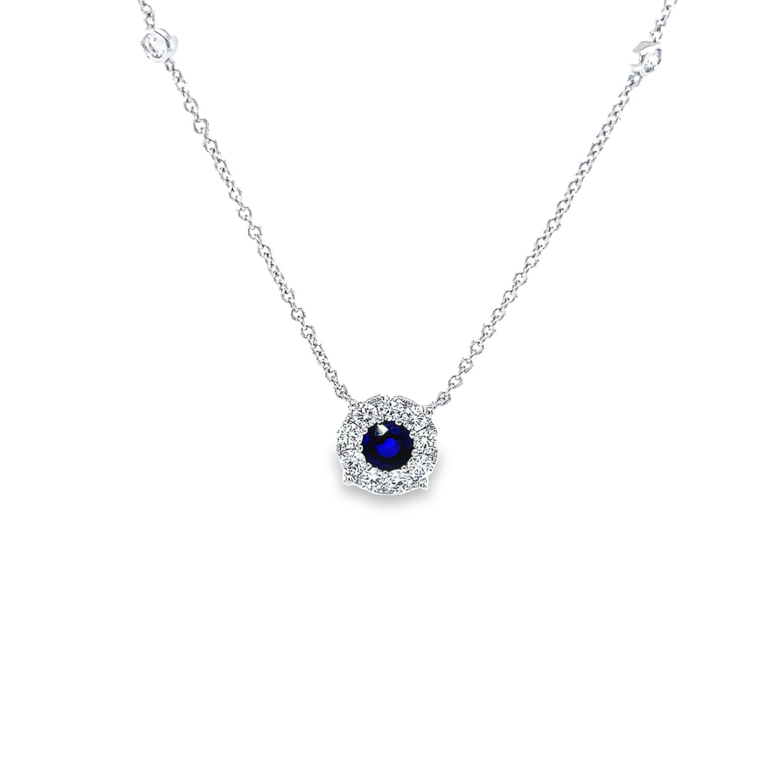 14 Karat white gold halo solitaire necklace with one 0.58 twt round mixed cut Sapphire and 13=0.44 total weight round brilliant G VS Diamonds