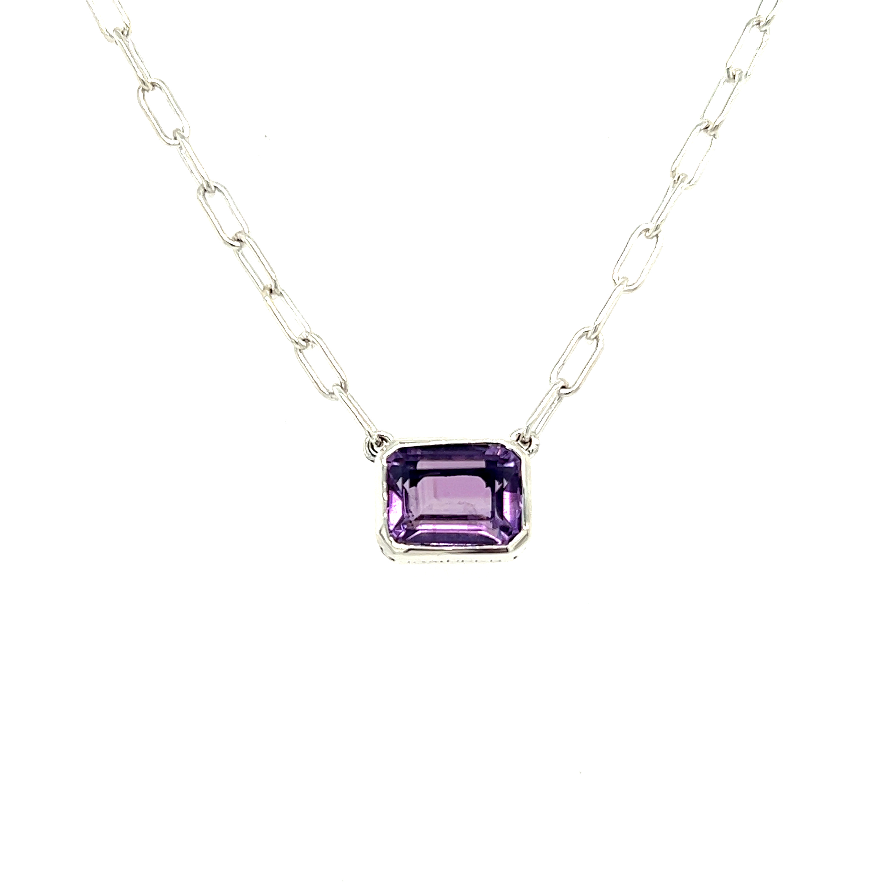 Sterling silver necklace with one bezel set emerald cut Amethyst.