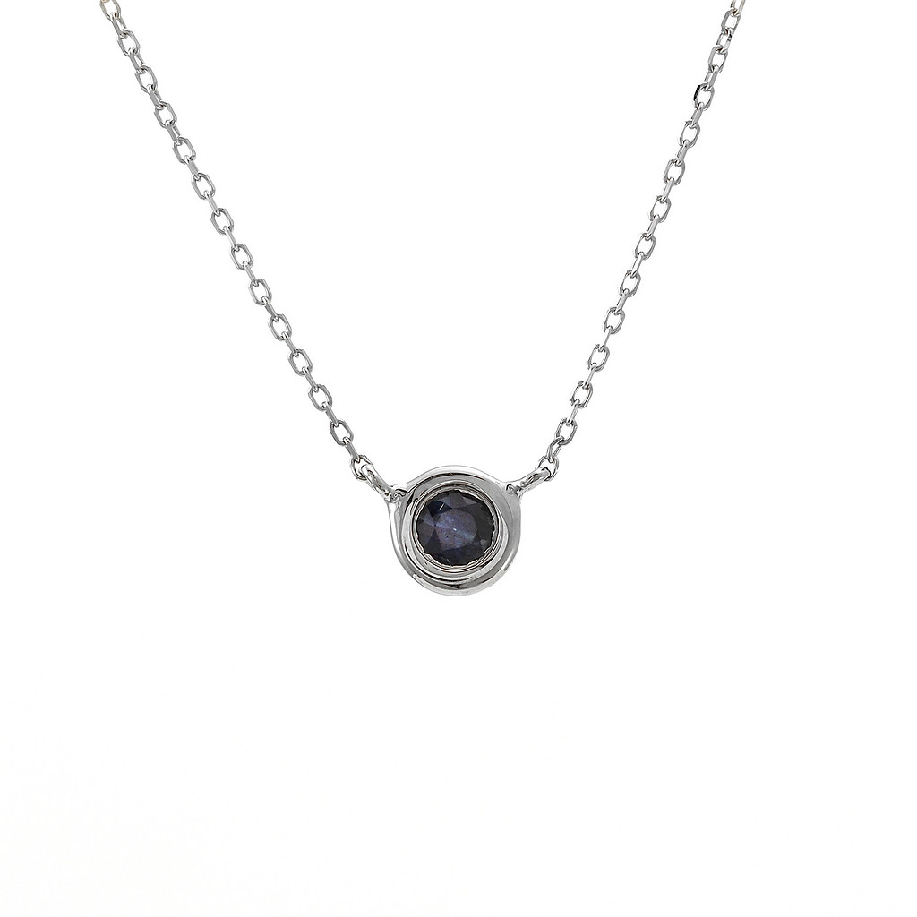 14 karat white gold solitaire necklace with One 0.11ct round mixed cut Sapphire