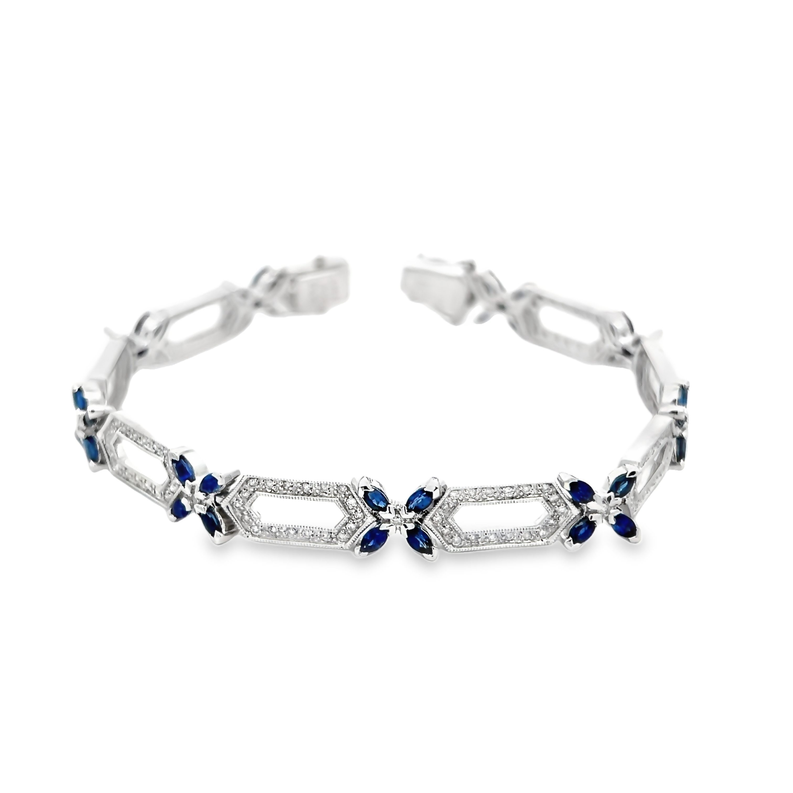 18 Karat white gold link bracelet with 36=3.38 total weight marquise cut Sapphires &   162=0.80 total weight round brilliant Diamonds. Length 7.25"