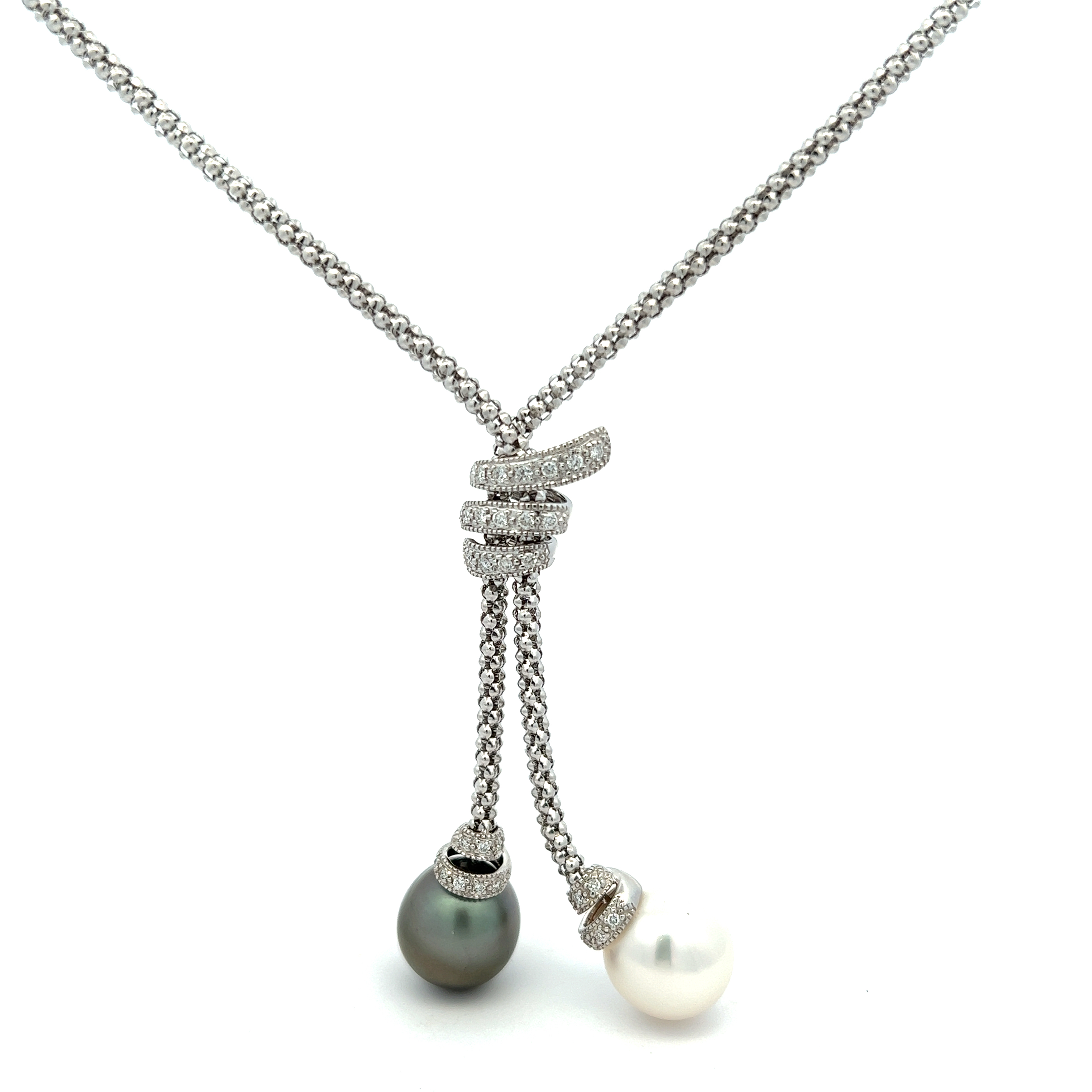 18 Karat white gold necklace with One 12.50mm South Sea Pearl  One 12.60mm Tahitian Pearl and 31=0.30 total weight round brilliant G SI Diamonds