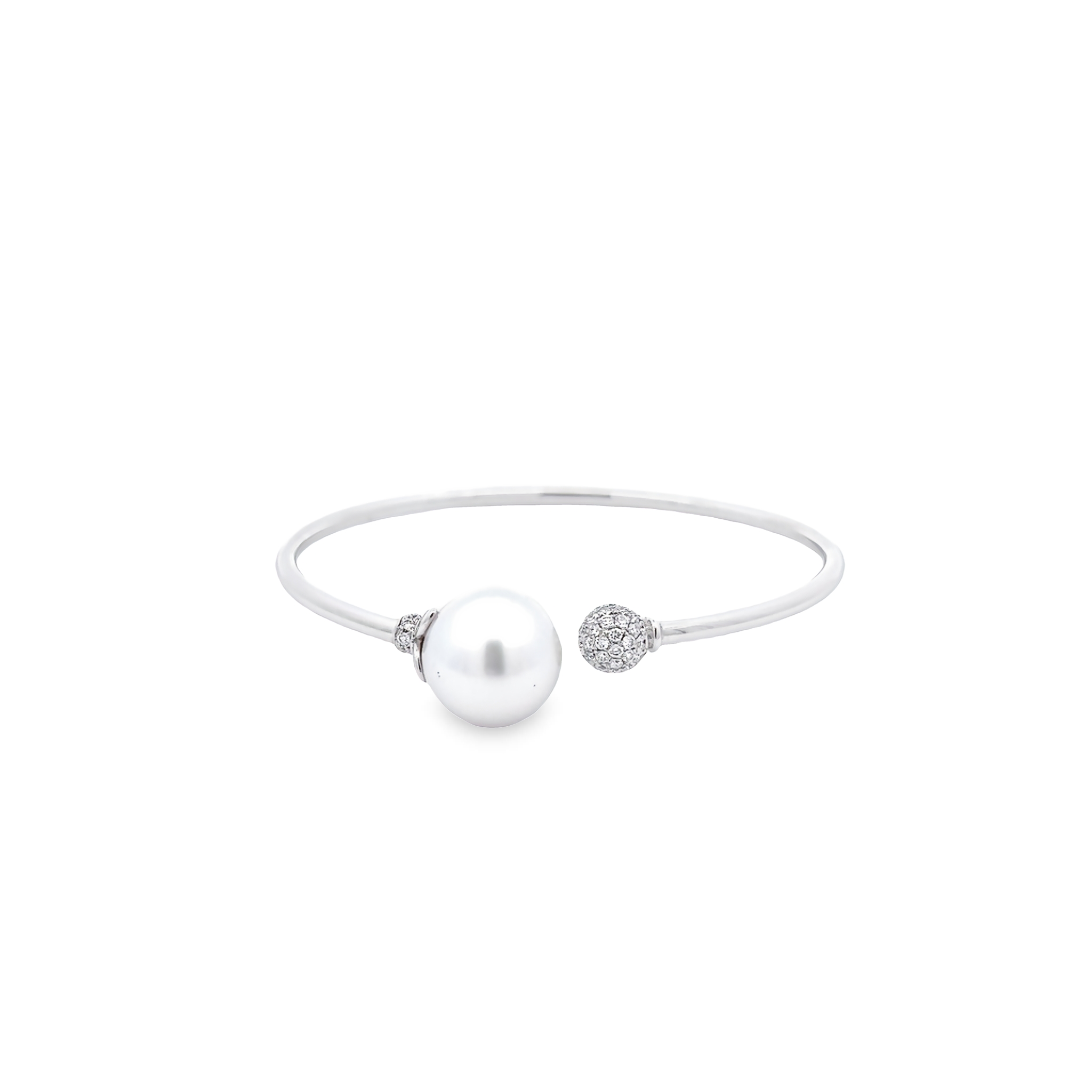 18 Karat white gold open bangle with One 5.0g 12-13mm South Sea Pearl and 50=0.40 total weight round brilliant G SI Diamonds