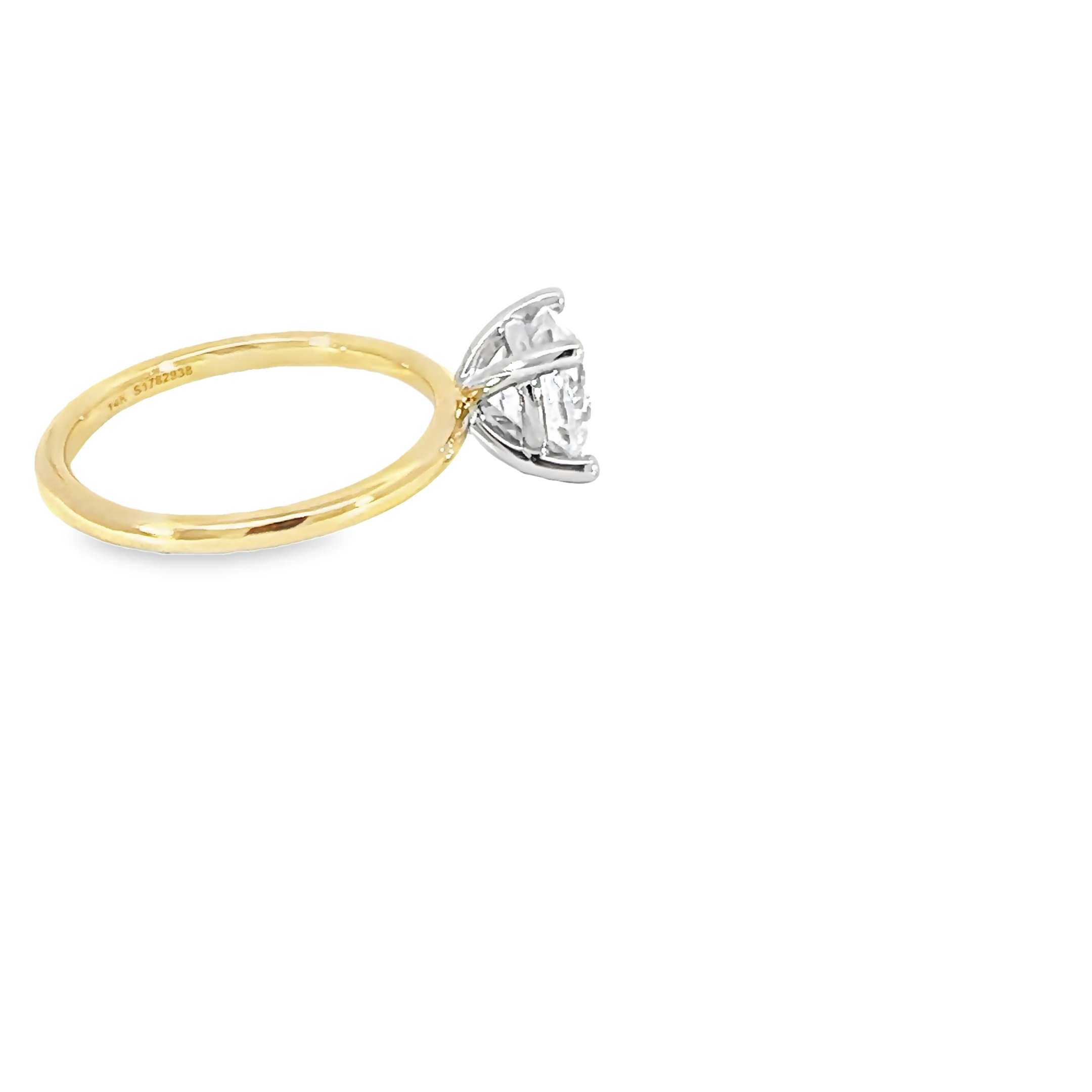 14 Karat Yellow Gold Solitaire Semi Mount Engagement Ring With A 14 Karat White Gold Head.