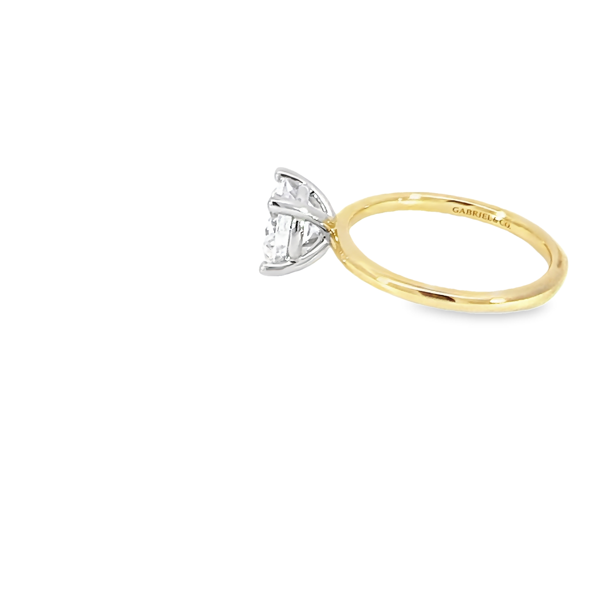 14 Karat Yellow Gold Solitaire Semi Mount Engagement Ring With A 14 Karat White Gold Head.