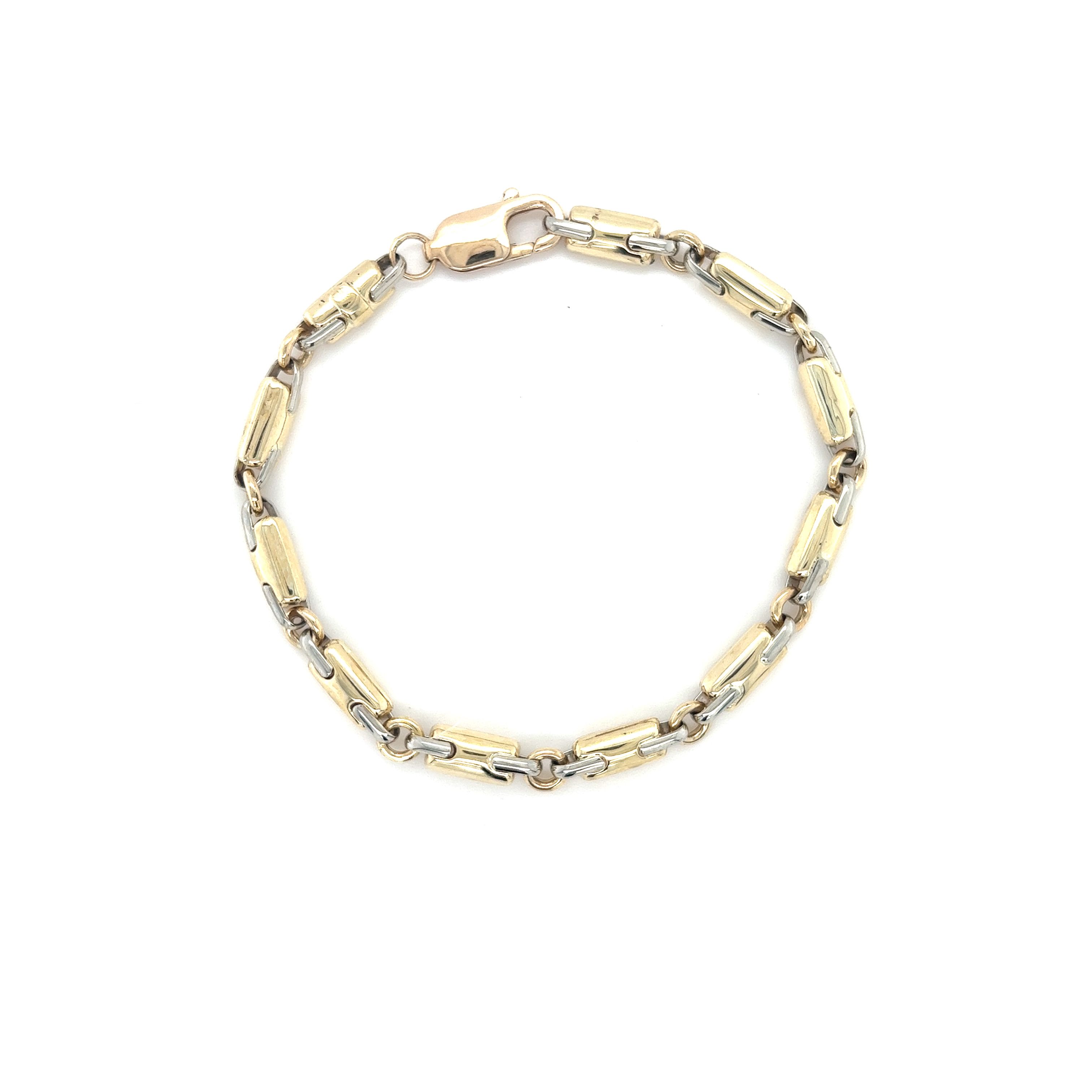 14 Karat two tone fancy link bracelet. Length 8
