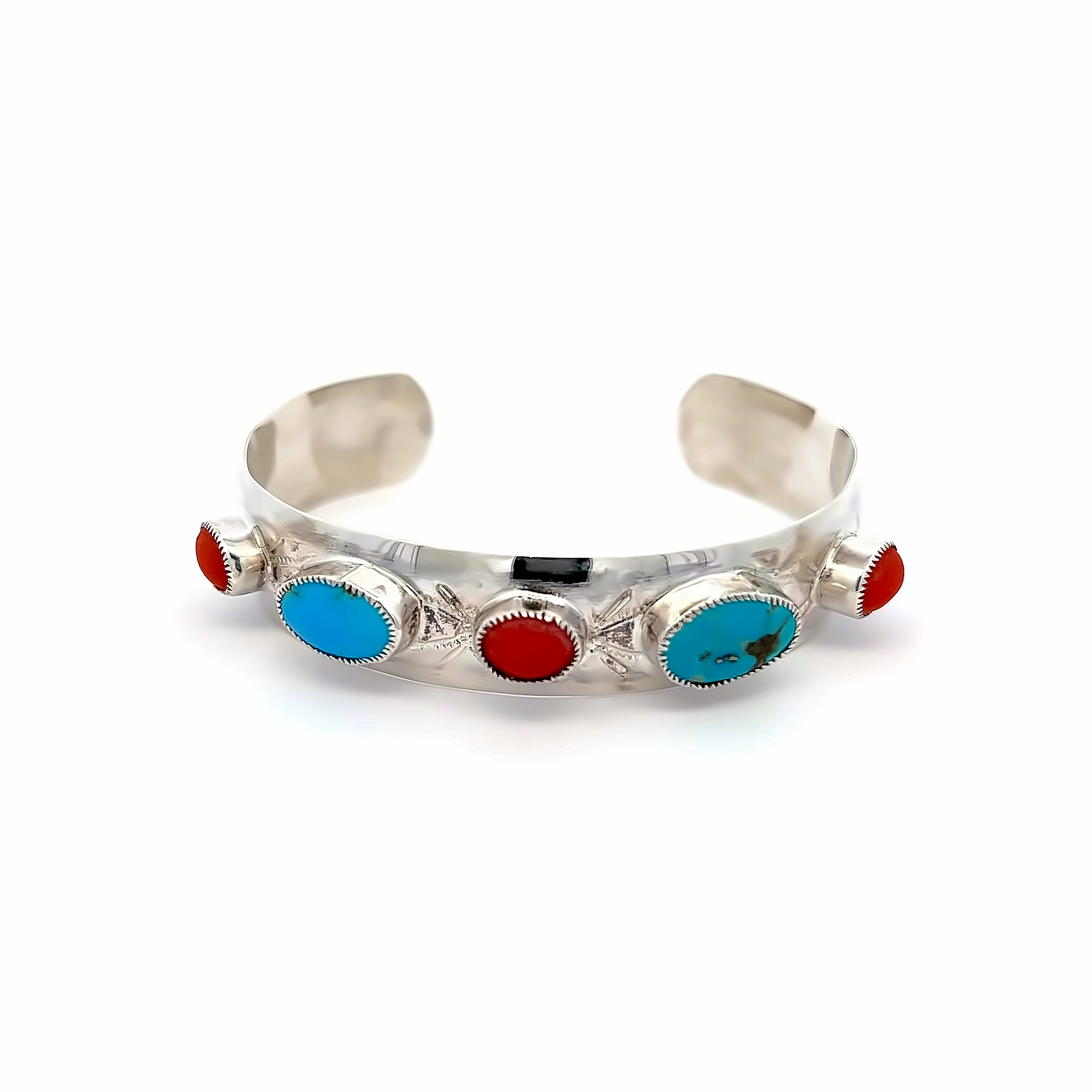 Sterling cuff bracelet with Turquoise and Coral Stones.