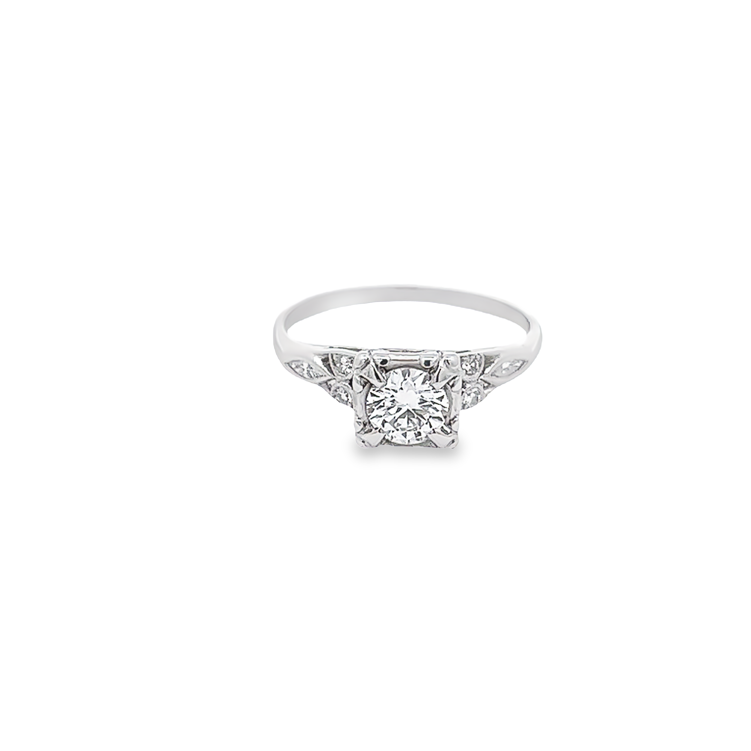 Platinum ring with one 0.60Ct round brilliant G VS Diamond and 6 single cut diamonds. Size 6