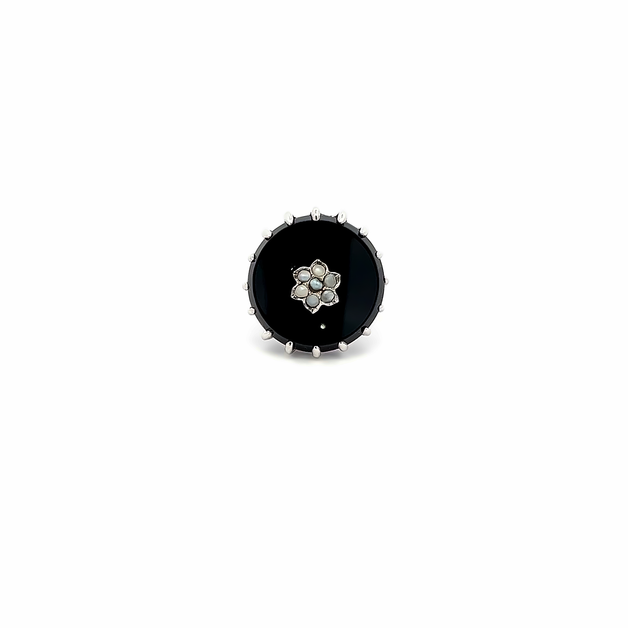 White 14 Karat Antique Ring With 7 seed pearls in the center of one black onyx plate.