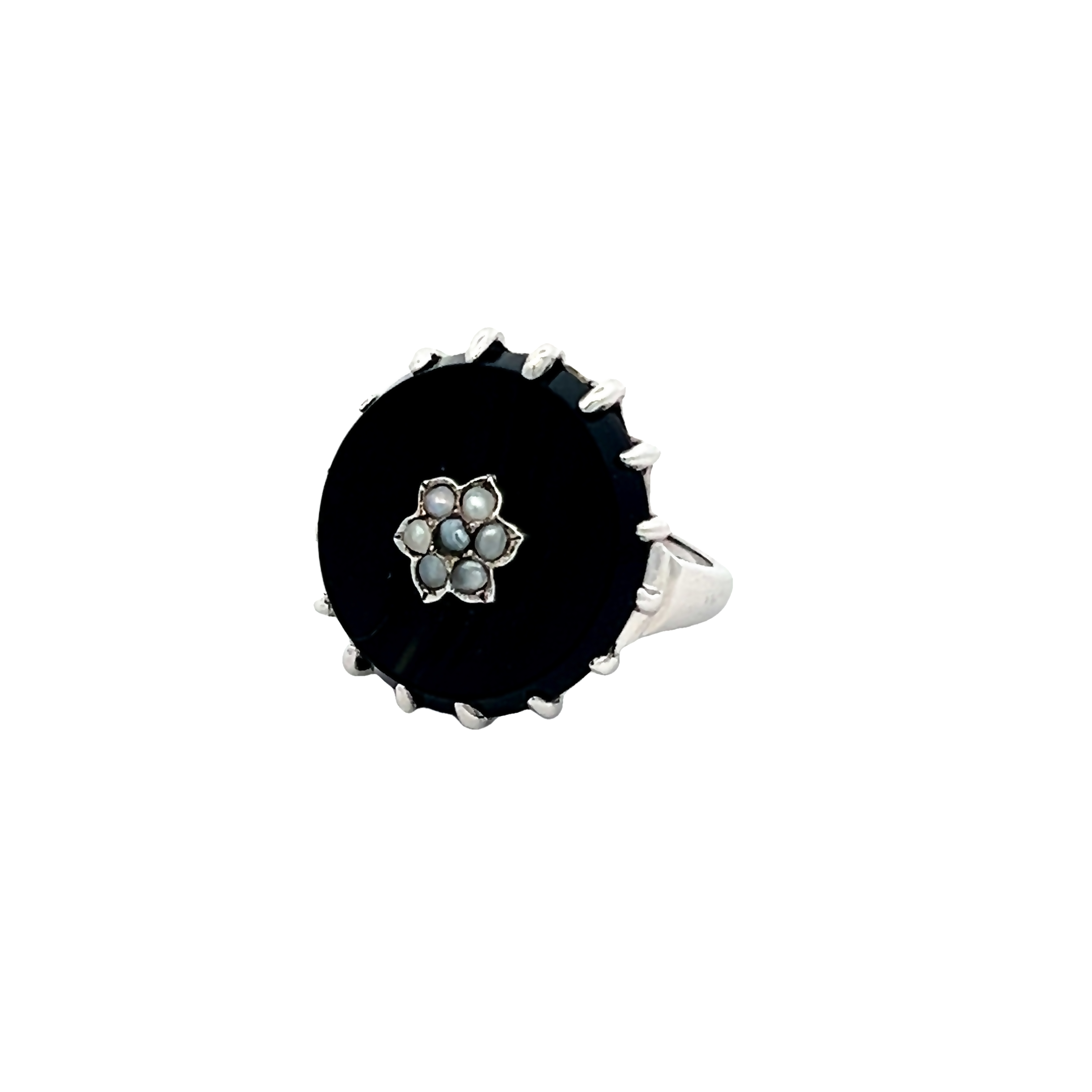 White 14 Karat Antique Ring With 7 seed pearls in the center of one black onyx plate.