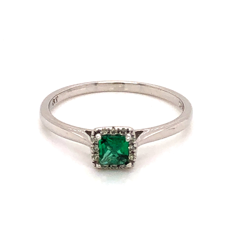 14 Karat white gold ring Size 7 with One 0.30Ct princess cut Emerald and 12=0.03 total weight round brilliant G I Diamonds