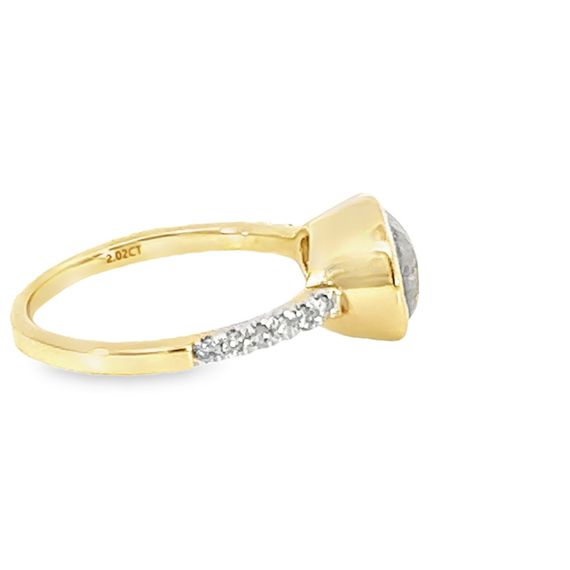 14 Karat yellow gold engagement ring Size 7 with One 1.85Ct pear salt and pepper Diamond and 12=0.17Tw Round Brilliant G SI Diamonds