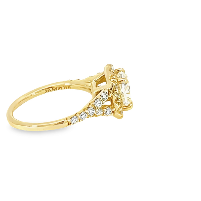 14 Karat yellow gold Engagement Ring With One 1.51Ct Cushion L VS1 Diamond and 28=0.74Tw Round Brilliant G Vs Diamonds